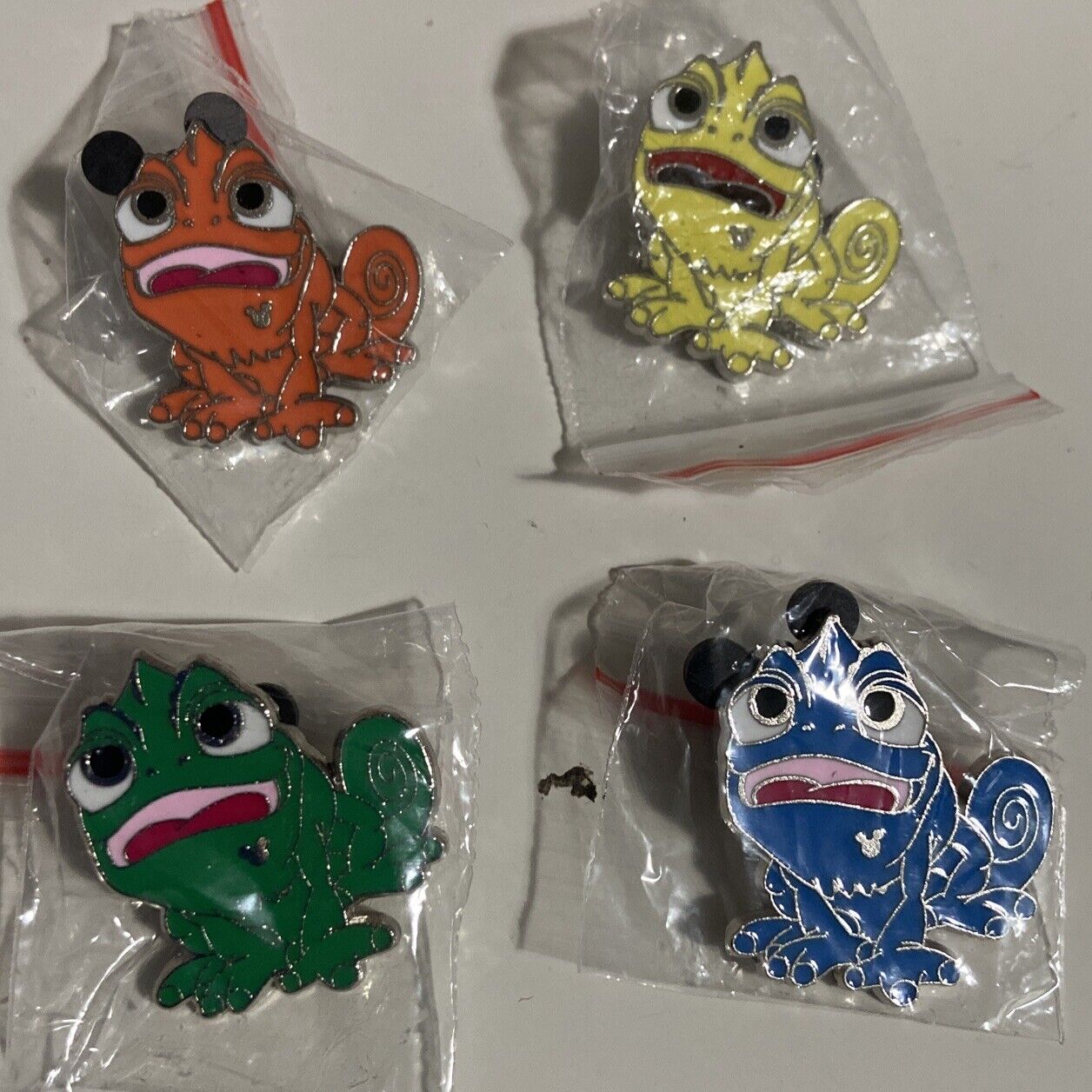 Disney PASCAL Only Pins lot of 4 Different Colors