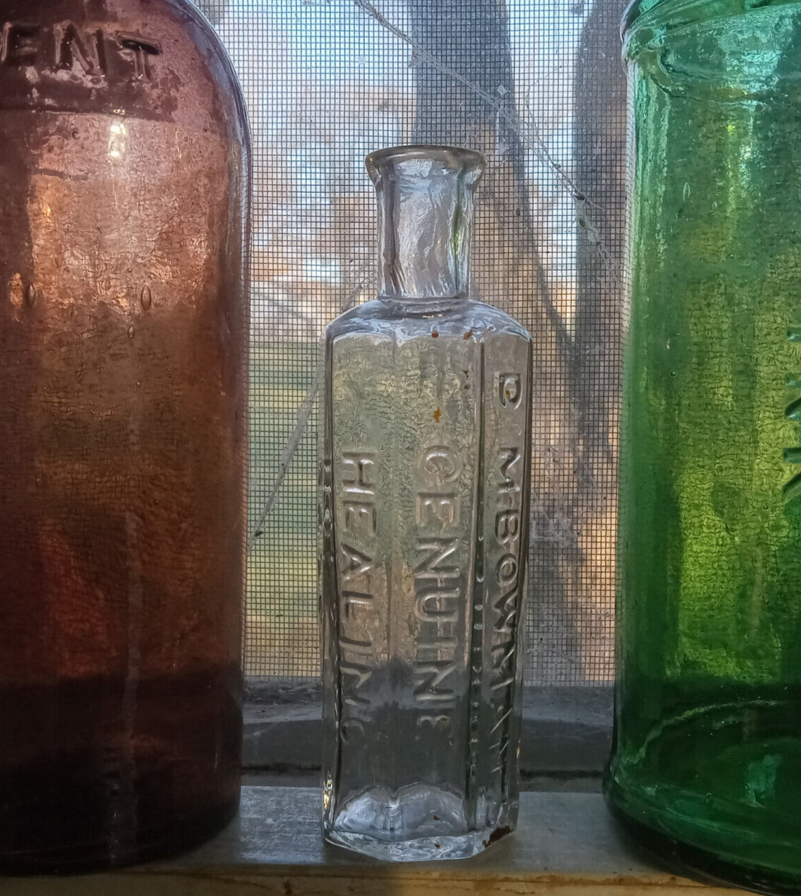 EARLY PONTILED FLINT GLASS DR.M.BOWMAN'S GENUINE HEALING BALSAM 8 SIDED BOTTLE