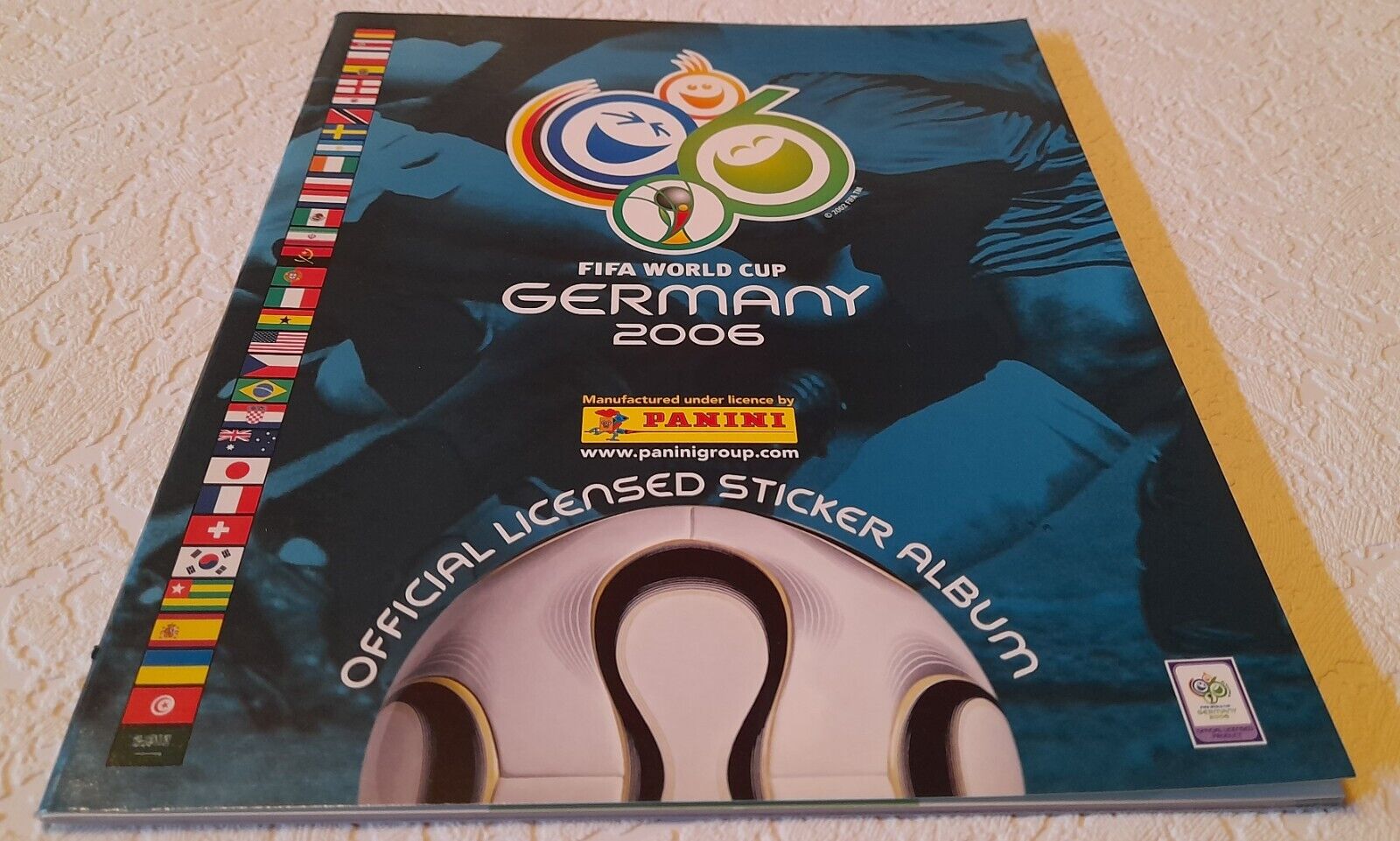 PANINI GERMANY 2006 FIFA WORLD CUP EMPTY ALBUM + 6 STICKERS - NEW WM GERMAN VER.