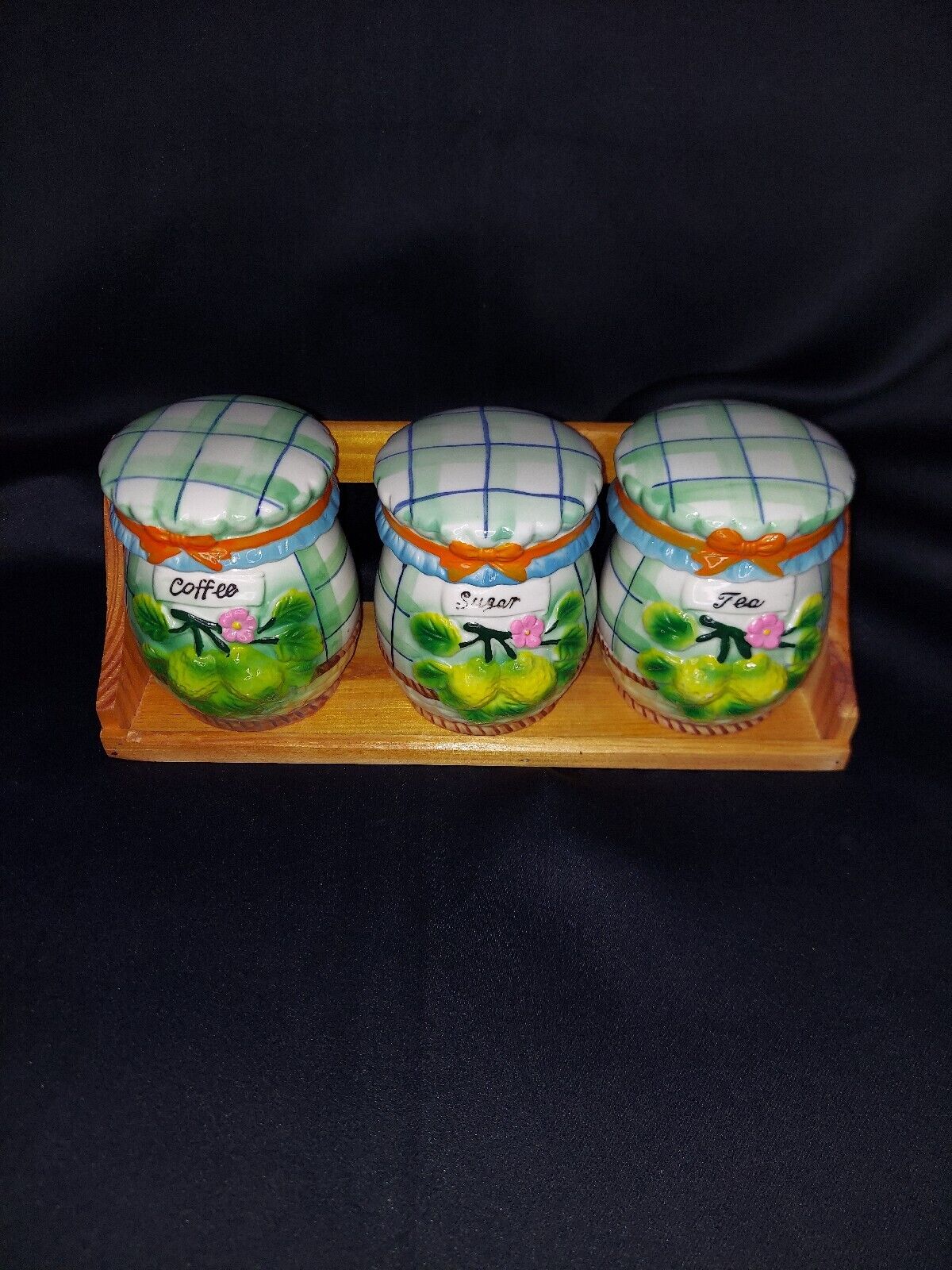 Vintage Set Of 3 Retro Tea, Coffee, And Sugar Canisters with Wooden Rack