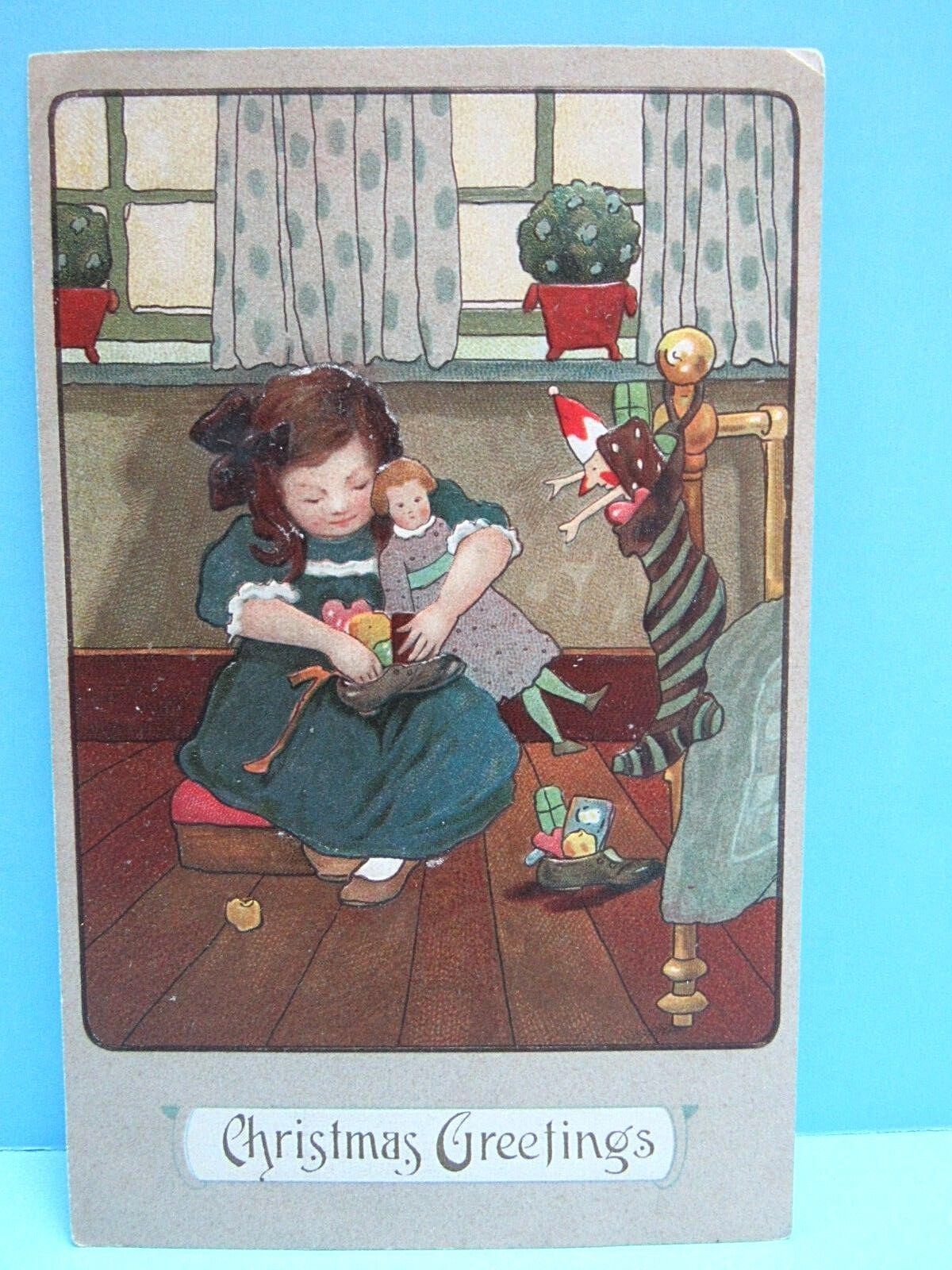 VTG 1900's NOS - EMBOSSED  PC - YOUNG GIRL OPENING GIFTS ON CHRISTMAS GERMANY