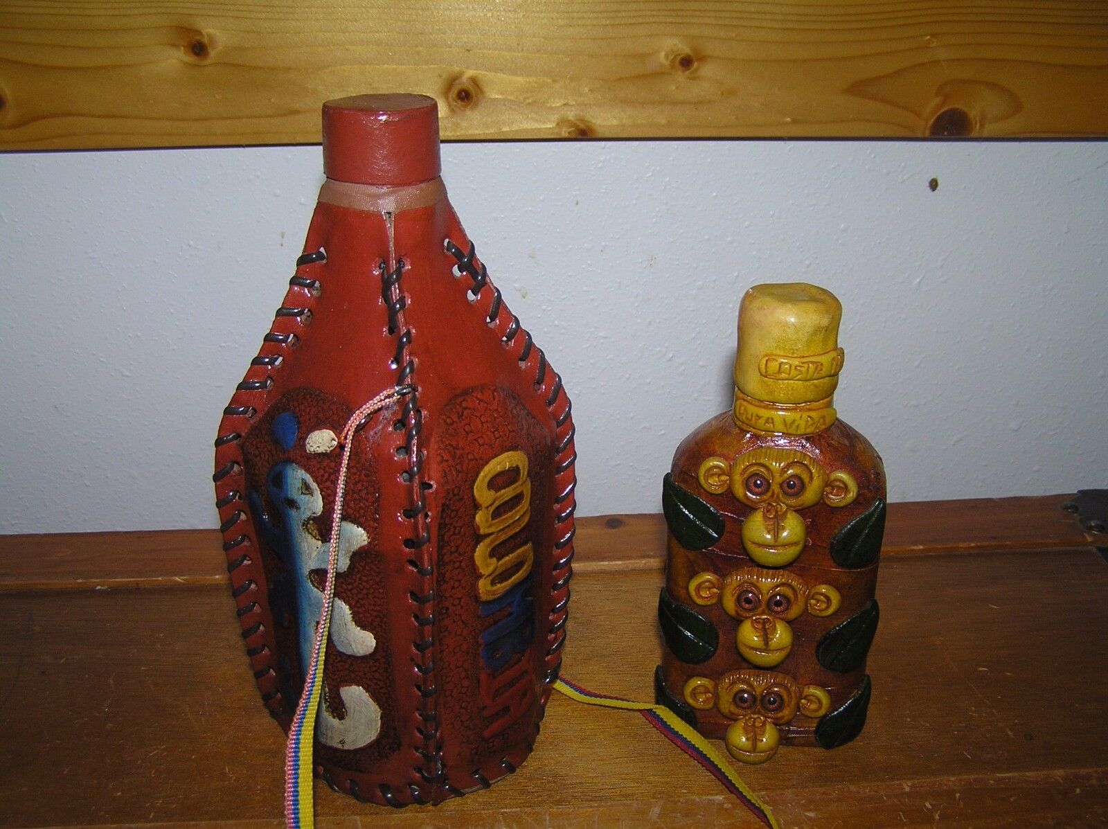 Lot of 2 Costa Rica Three Monkeys Decorated Tooled Leather Parrot Liquor Bottle