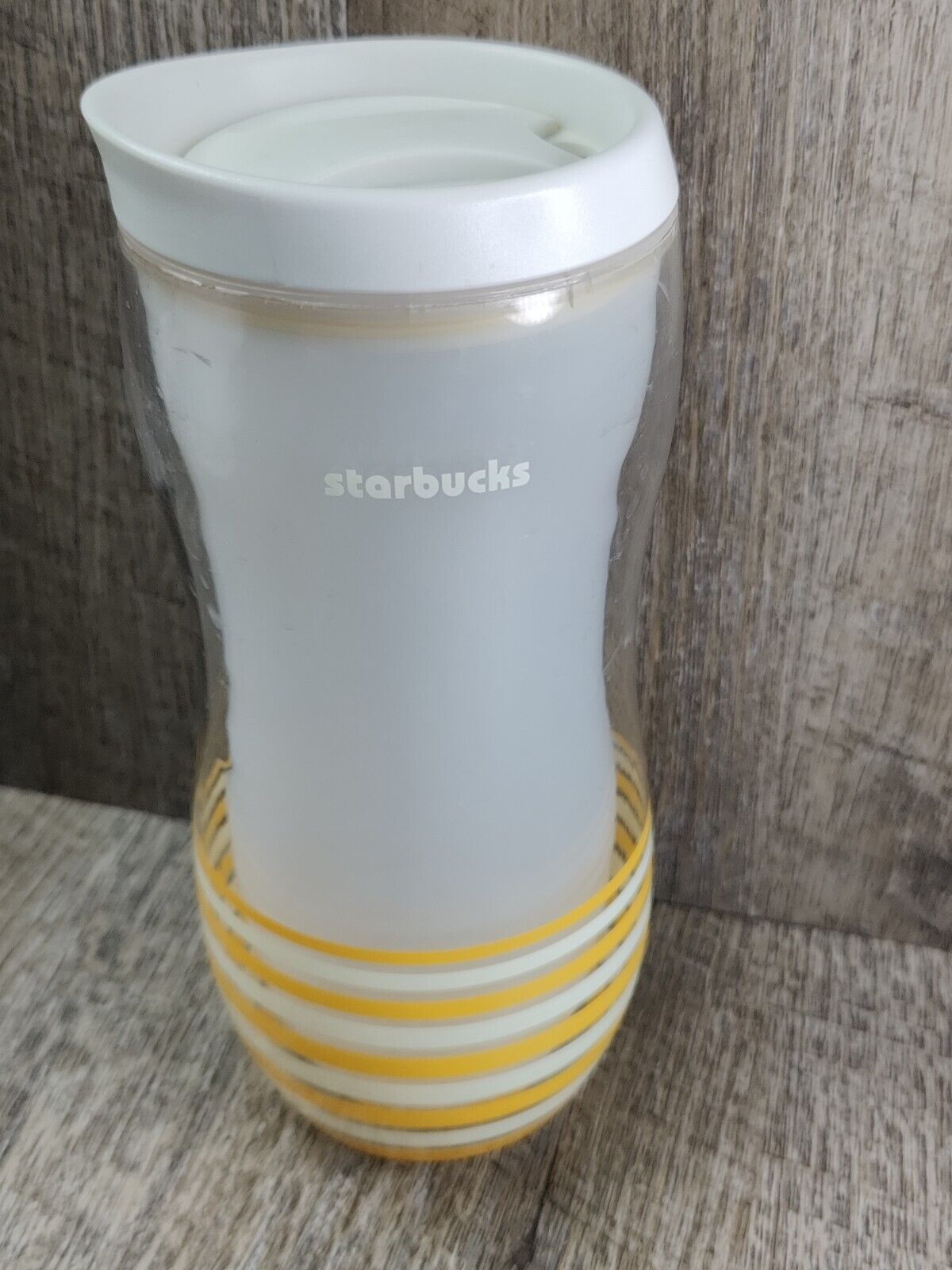 Vintage Starbucks beverage cup 2004 Plastic Tumbler 16 oz Yellow White Stripes.