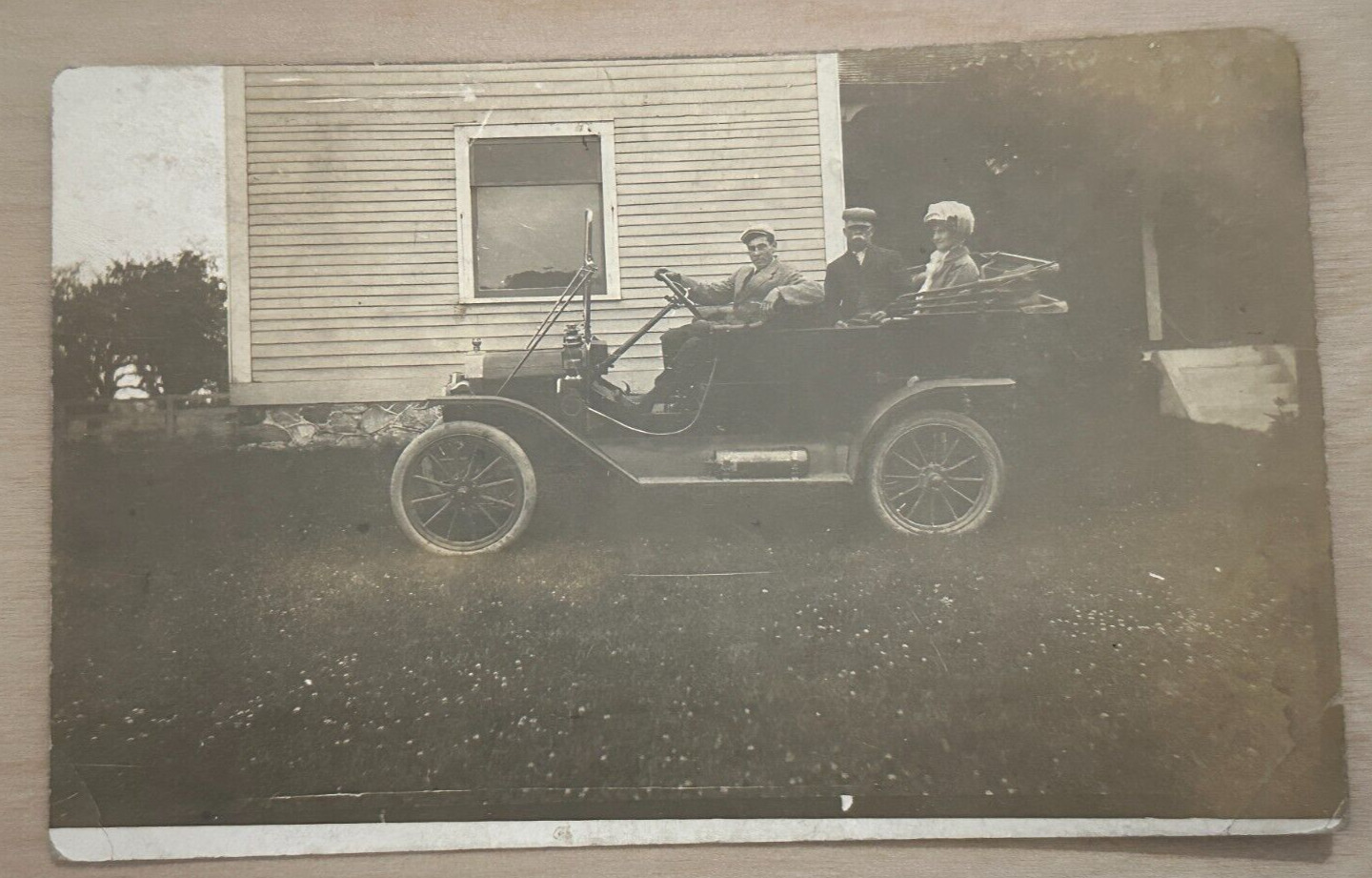 Vintage 1912 RPPC Postcard featuring Ford Model T Car in Front of a House