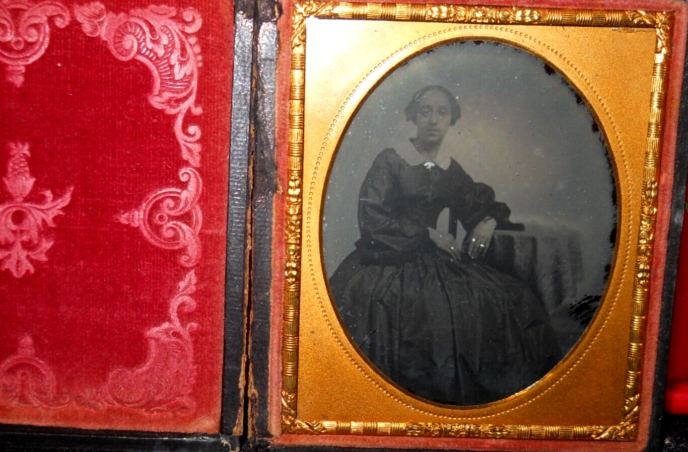 1/6th Size Ambrotype of lady and jewelry in full case, split at hinge