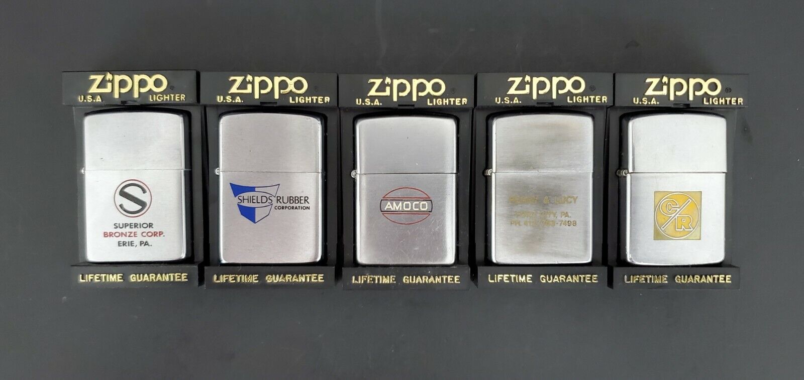 Very Rare Collection of 5 Zippo Lighters with various Company Logo\'s
