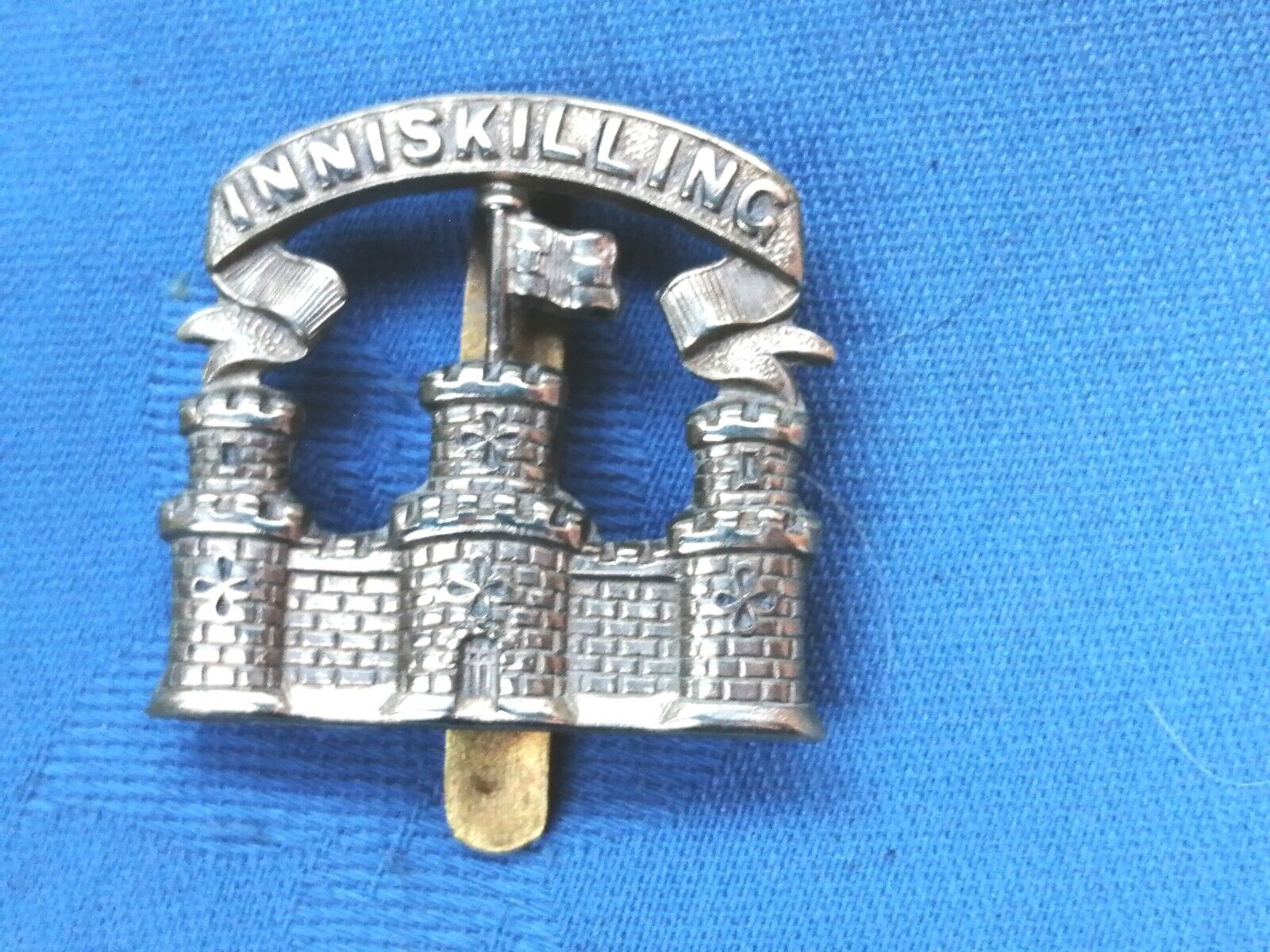 The Royal Inniskilling Fusiliers cap badge.                       1926/34.