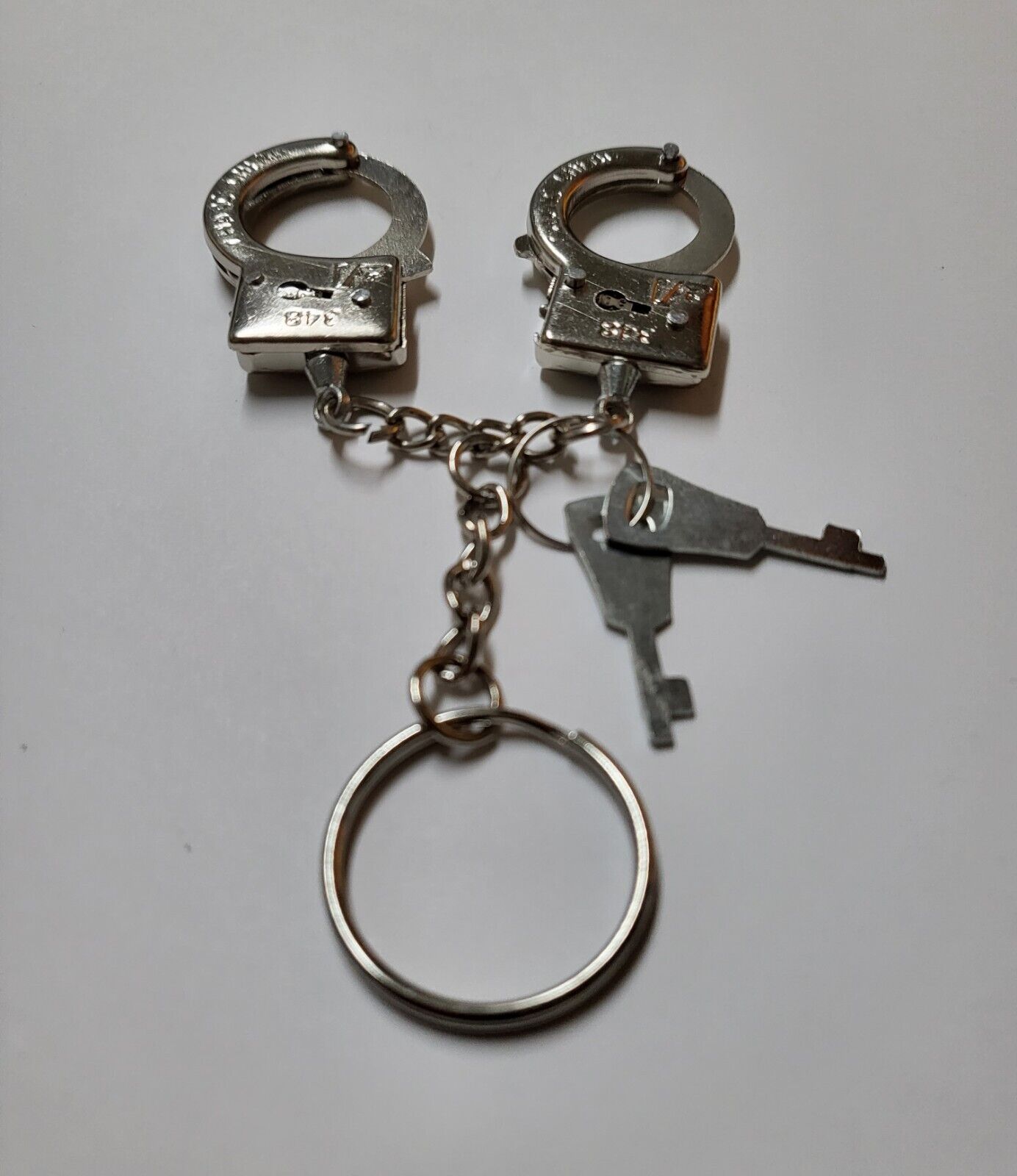 New in Package~(1) Set of Miniature Working Handcuffs Key Ring with Keys
