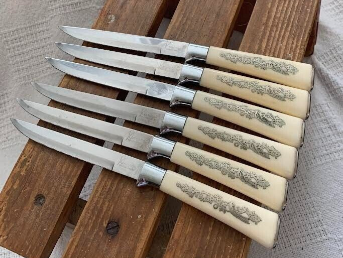 6 Vintage Riviera Ivory color with silver inlay and Stainless Steel Steak Knives