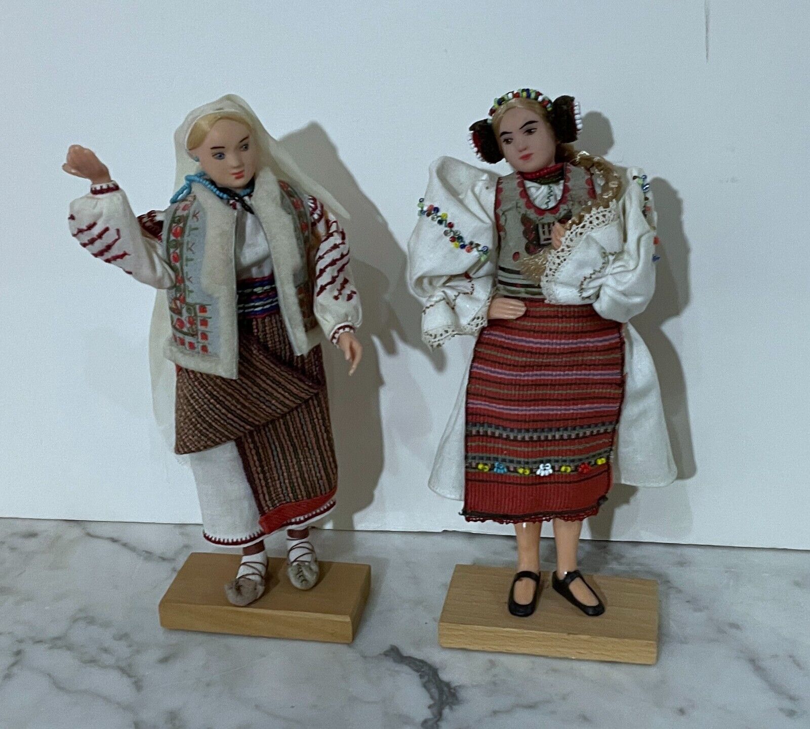 TWO BEAUTIFUL VINTAGE EUROPEAN ROMANIAN DOLLS OF FEMALES IN TRADITIONAL CLOTHES