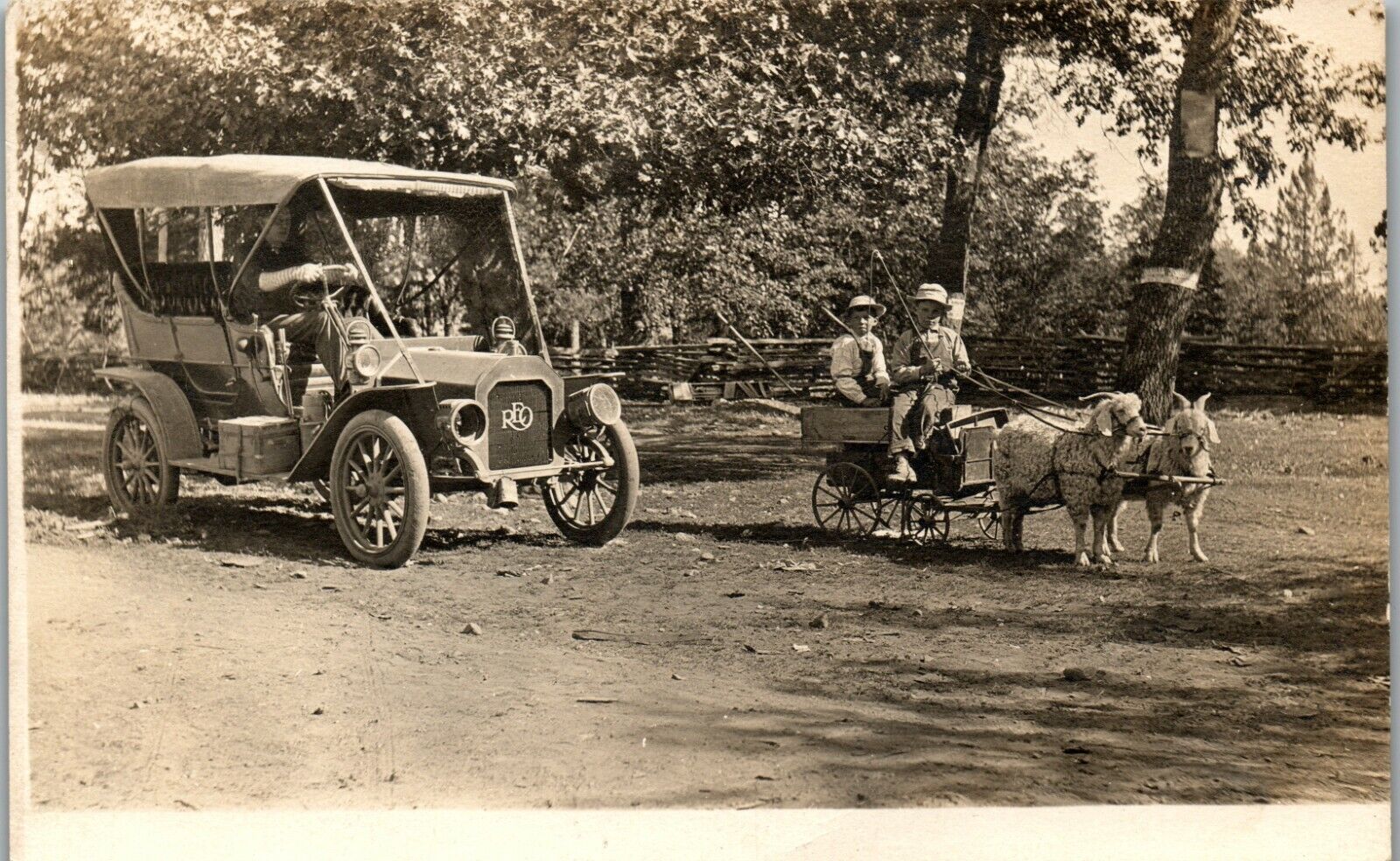 REO Car Owner 1906 with Goat Wagon and two boys Meridian ID Vintage Postcard RR1