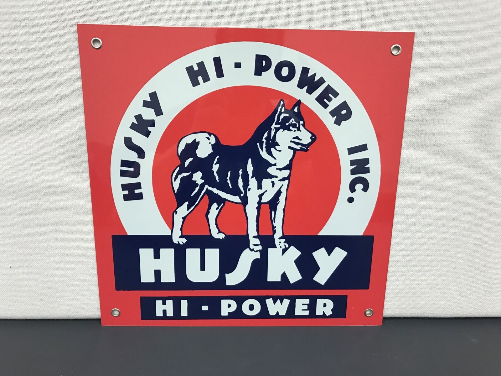 Husky hi power oil gasoline advertising sign