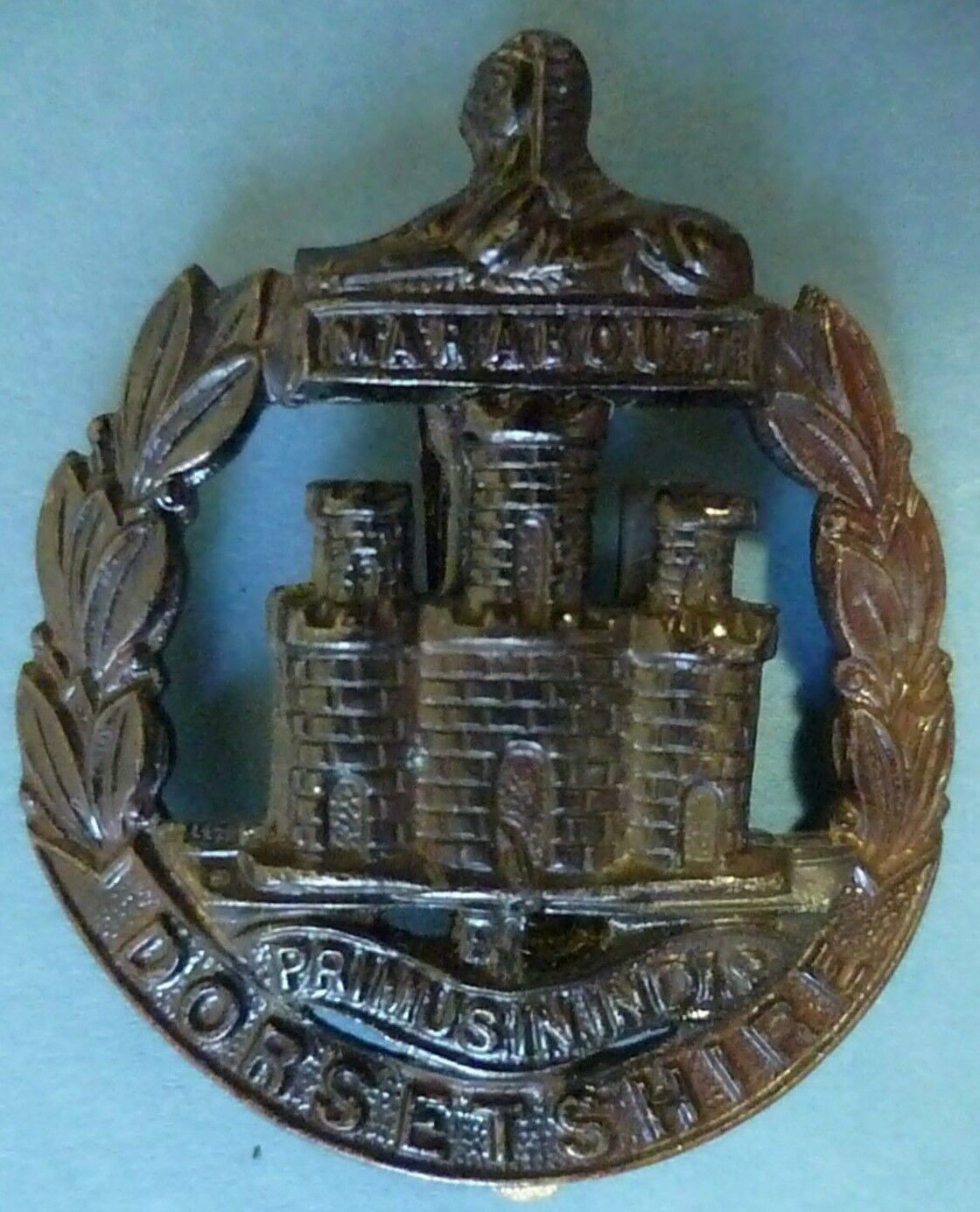 Dorsetshire Regiment Cap Badge Bronze Slider ANTIQUE Org