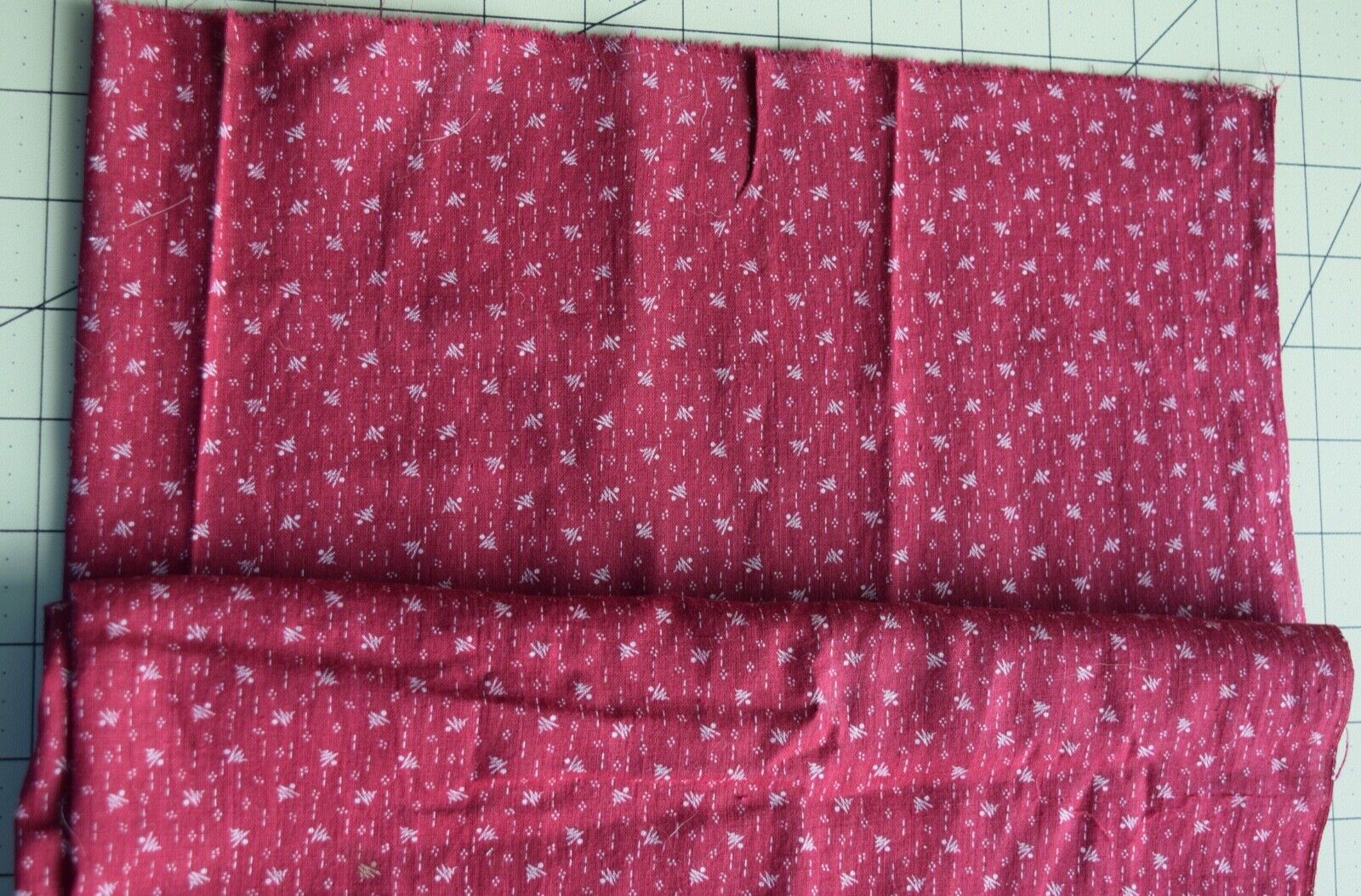 2967  1/4 yd antique 1890's cotton fabric, maroon with tiny white trees, figures
