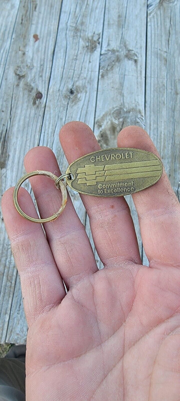 VINTAGE BRASS CHEVROLET COMMITMENT TO EXCELLENCE” RETURN POSTAGE KEY CHAIN  