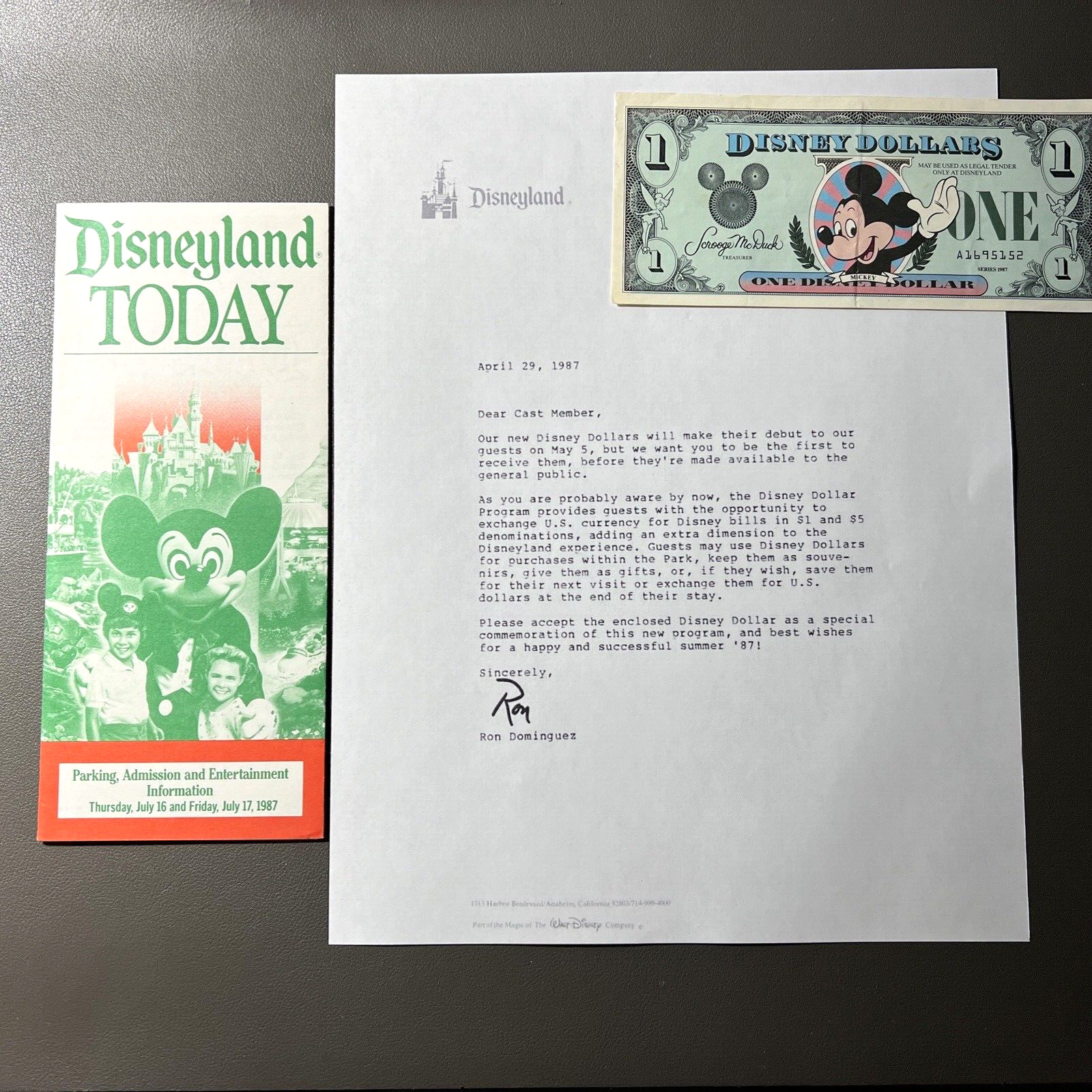 1987 FIRST EDITION $1 DISNEY DOLLAR MICKEY A SERIES WITH RELEASE LETTER & GUIDE