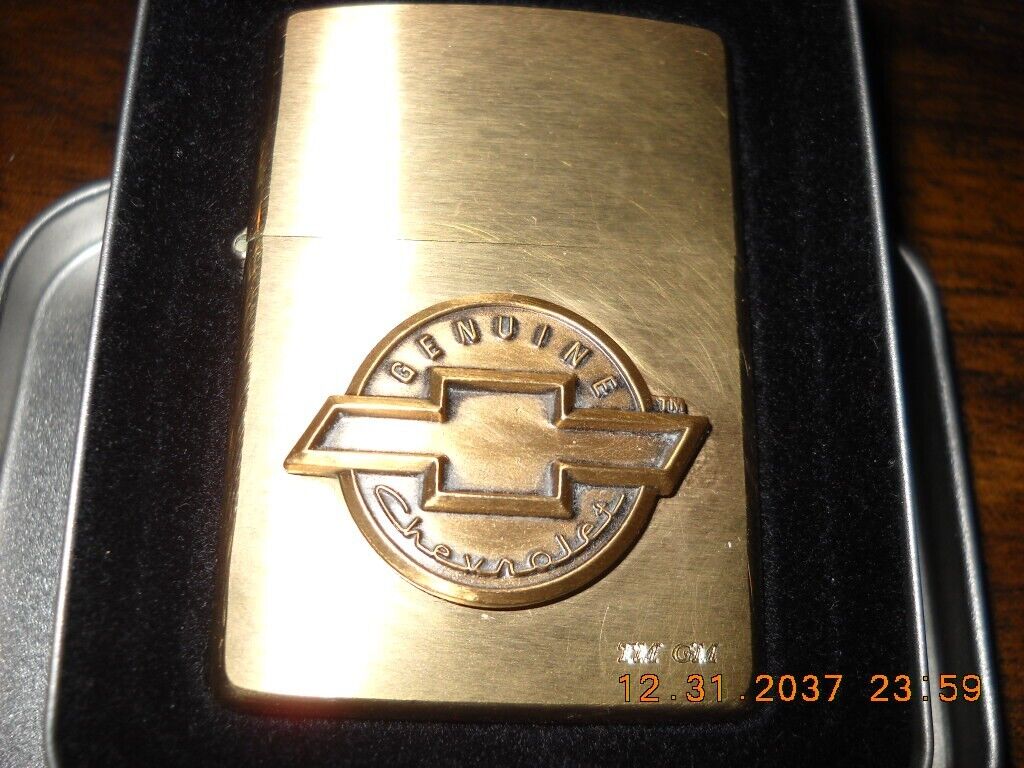 1999 NOS Chevy Emblem Zippo lighter Brass Original tin GM Chevrolet oval