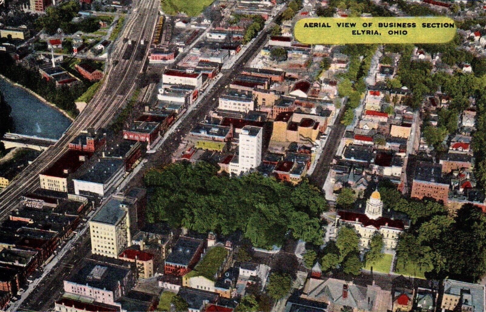 POSTCARD AERIAL VIEW OF BUSINESS SECTION ELYRIA, OHIO K5