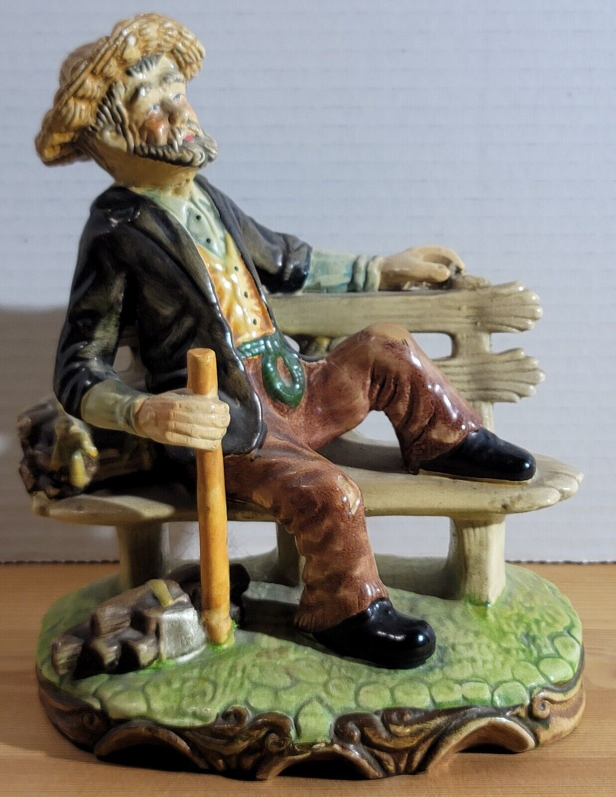 Vintage Capodimonte Style Man with Axe and Wood on Bench