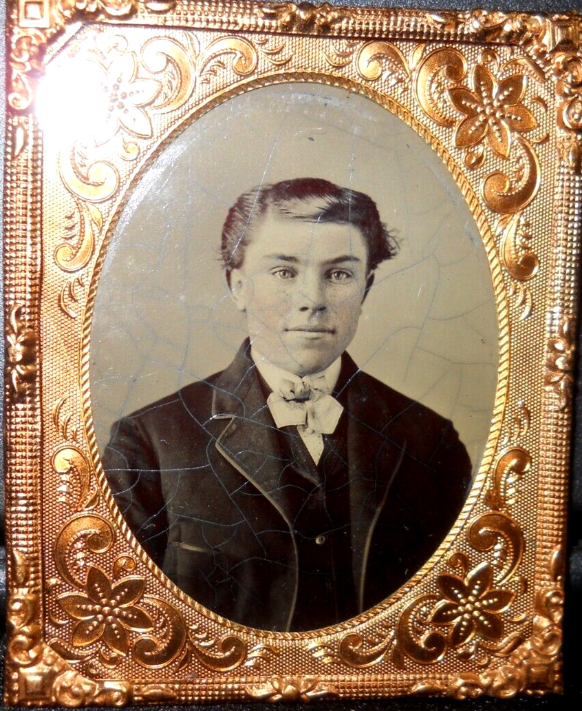 1/9th Size Tintype of handsome young man in brass mat/frame