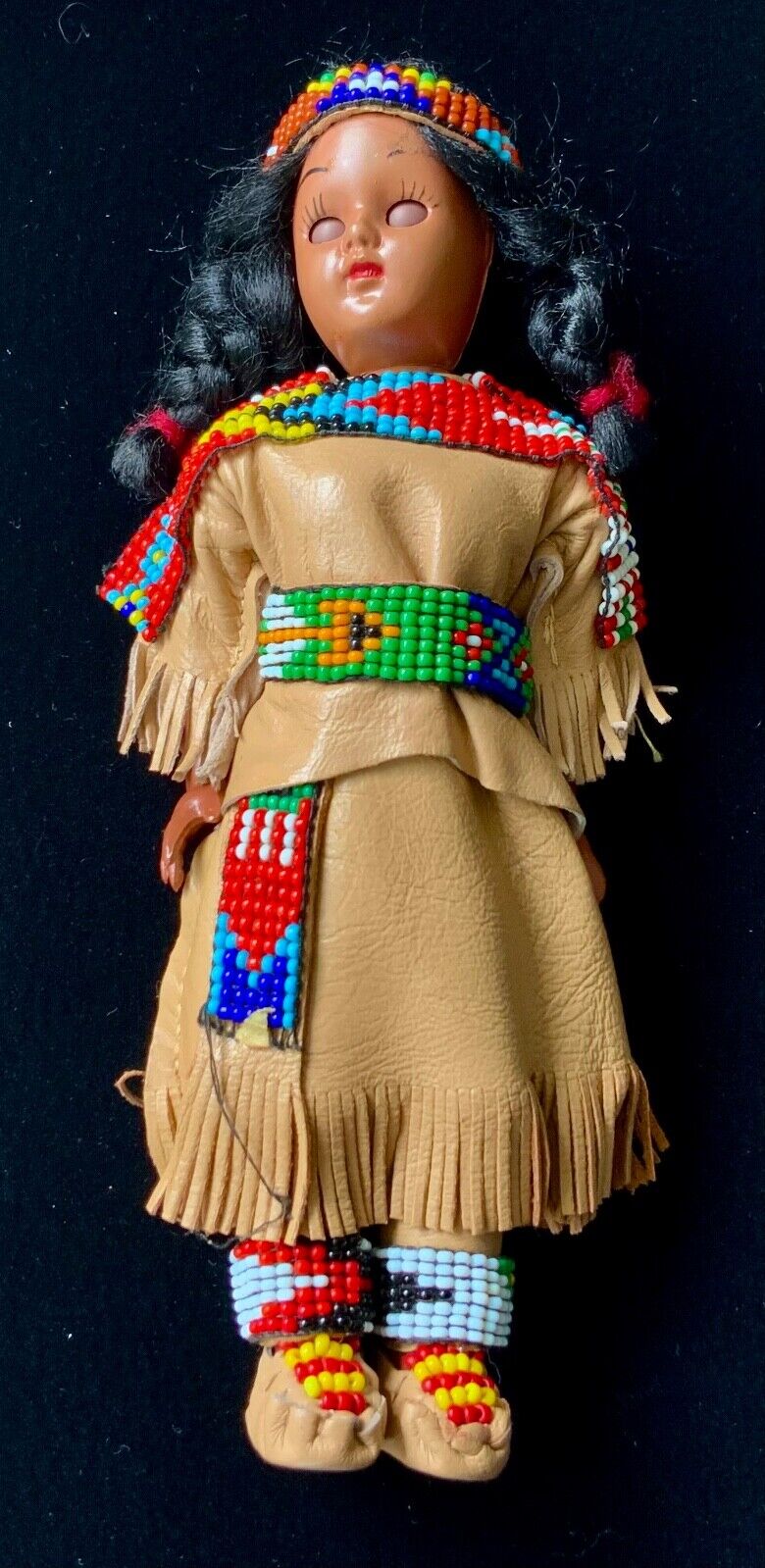 VTG Native American Souvenir Doll with elaborate beading.