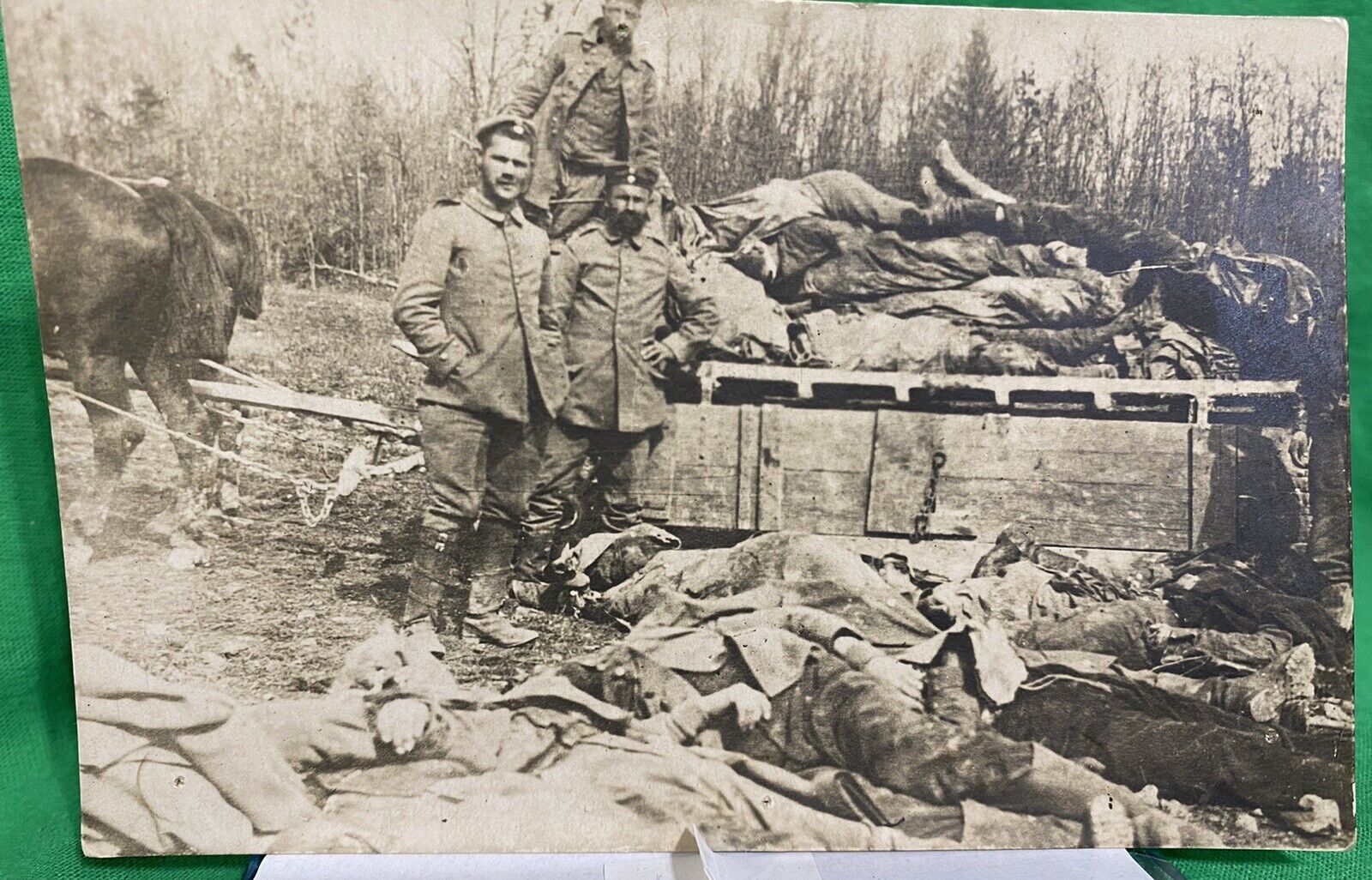 German WW1 Photo Soldiers Pose With Stacks of Dead Enemy Troops KIA Battle War