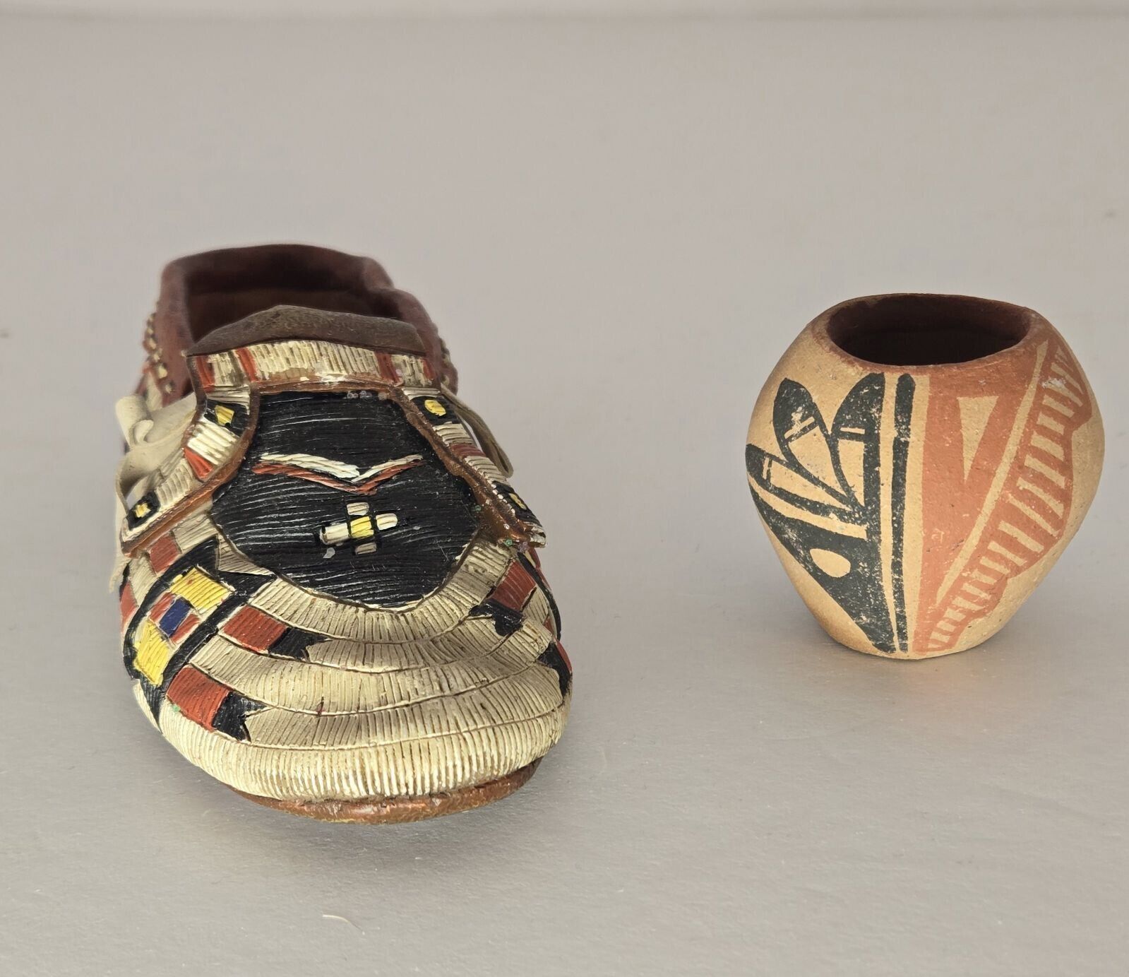 native american mini pottery and mini mocassin tabletop decor