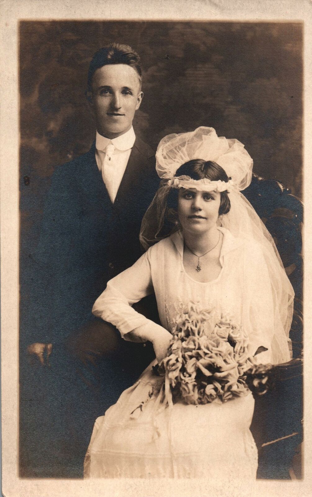 VINTAGE POSTCARD YOUNG BRIDE AND GROOM ON REAL PHOTO POSTCARD 1918 - 1930