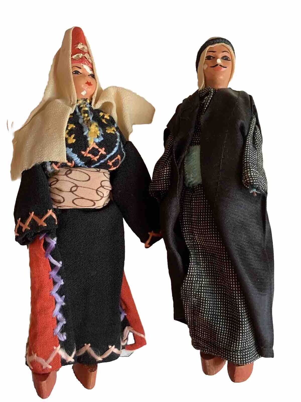 Two Vintage dolls in handmade ethnic dress