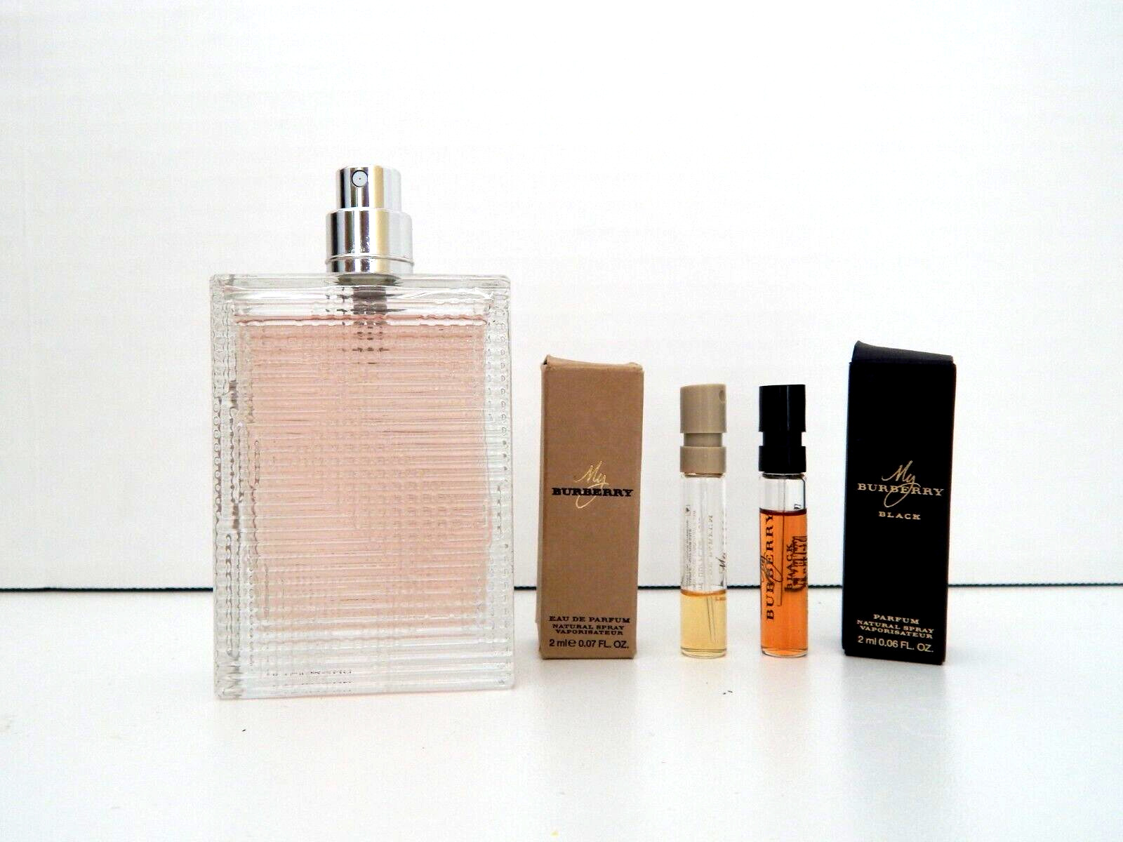Burberry Brit RHYTHM  edt spray @99%  + My Burberry Black parfum spray vial ++++