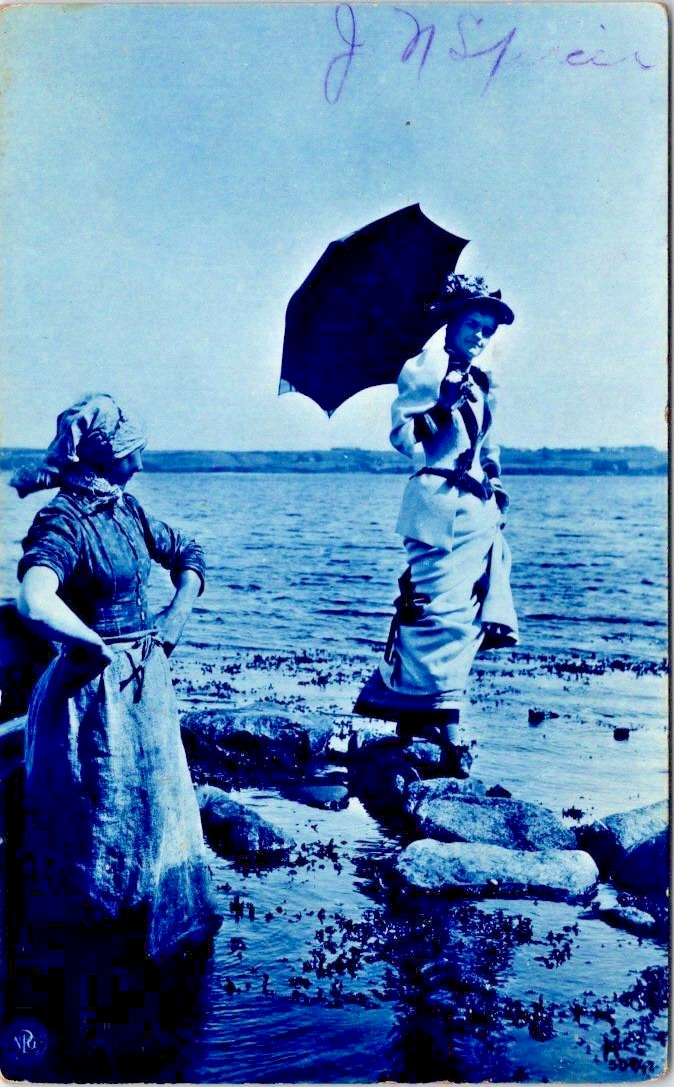 Postcard Undivided back two women at the beach in dress Blue Tint