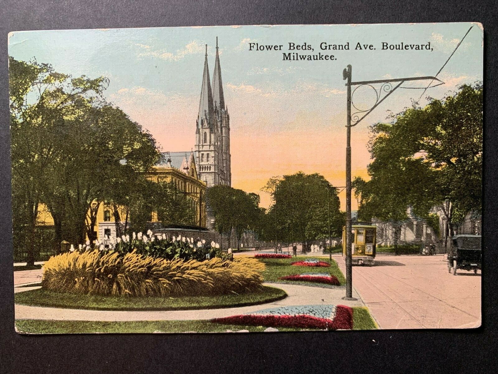 Postcard Milwaukee WI - c1910s Grand Avenue View - Flower Beds - Trolly