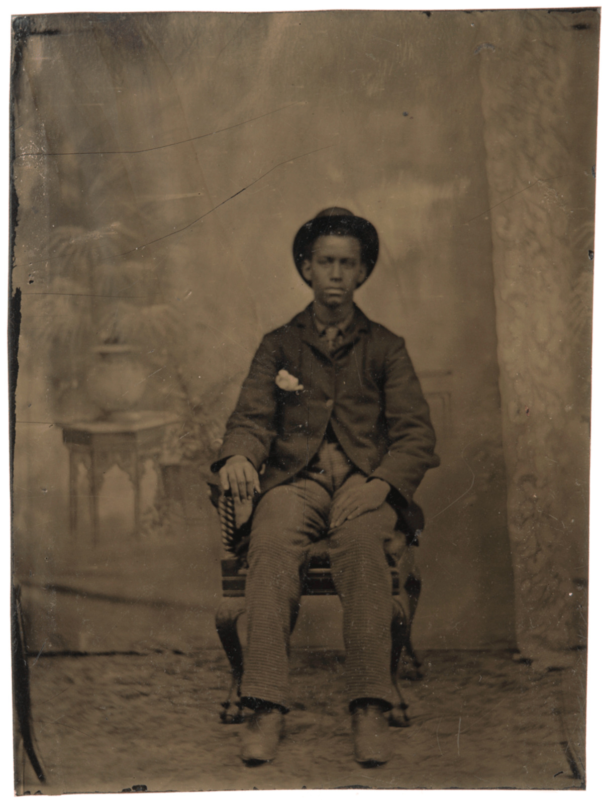 An Antique African American Tin Type Of A Young Man