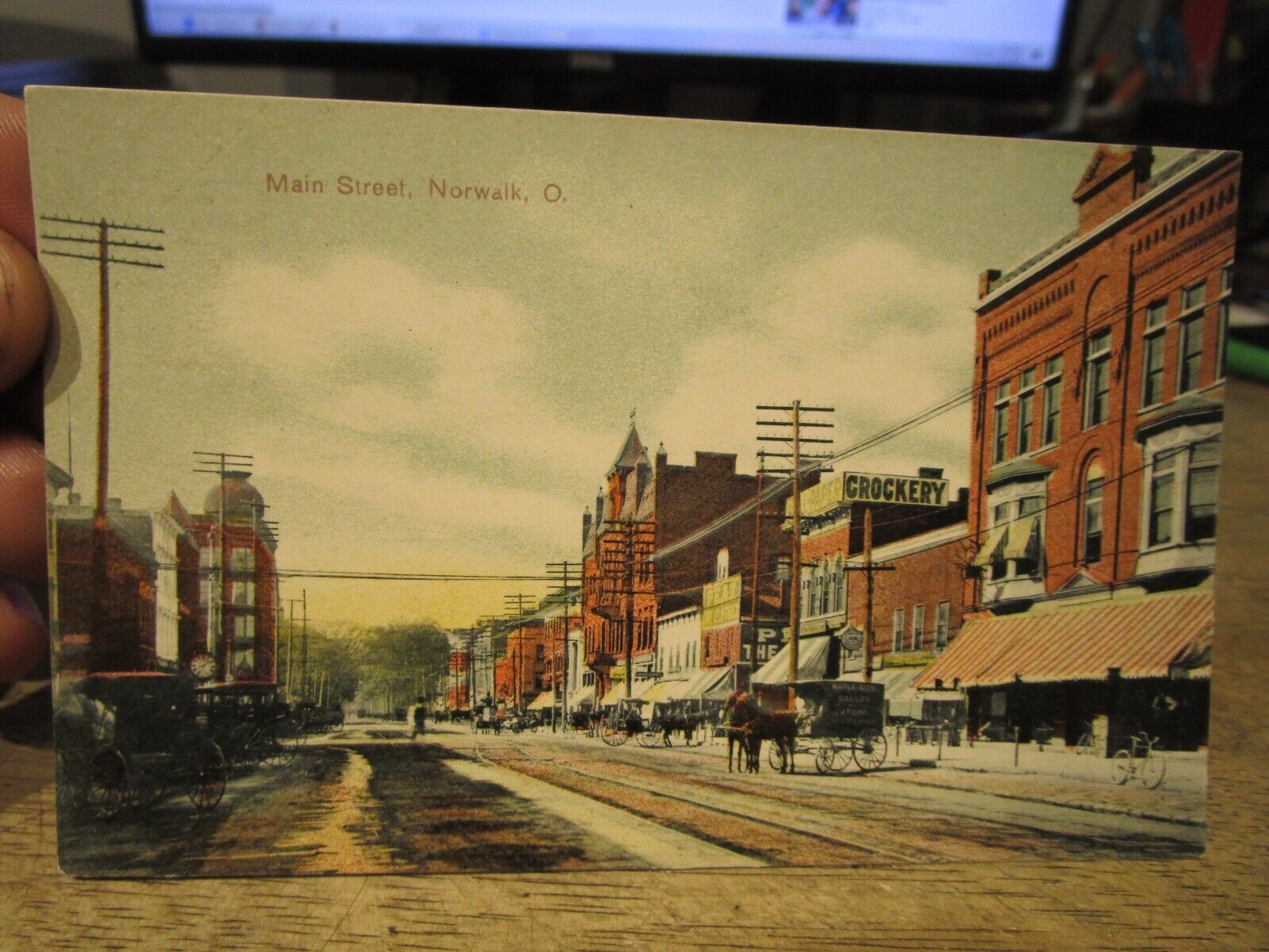 F1 Vintage Old OHIO Postcard NORWALK Main Street Crockery Wallpaper Store Bakery