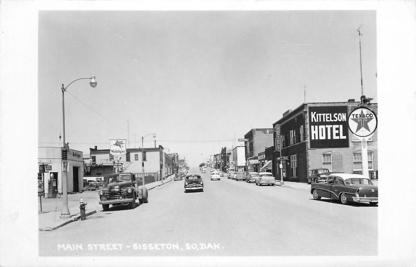 c1950 Main Street, Texaco Gas, Sisseton, South Dakota Real Photo Postcard/RPPC