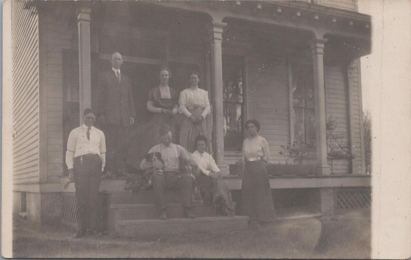 RPPC Postcard Family on Porch With Dogs c. 1900s