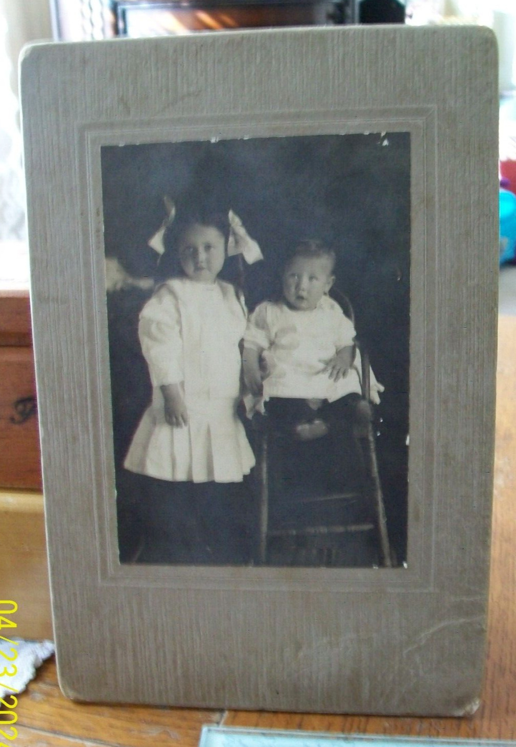 Antique Photograph Children Little Girl standing and one sitting on high chair
