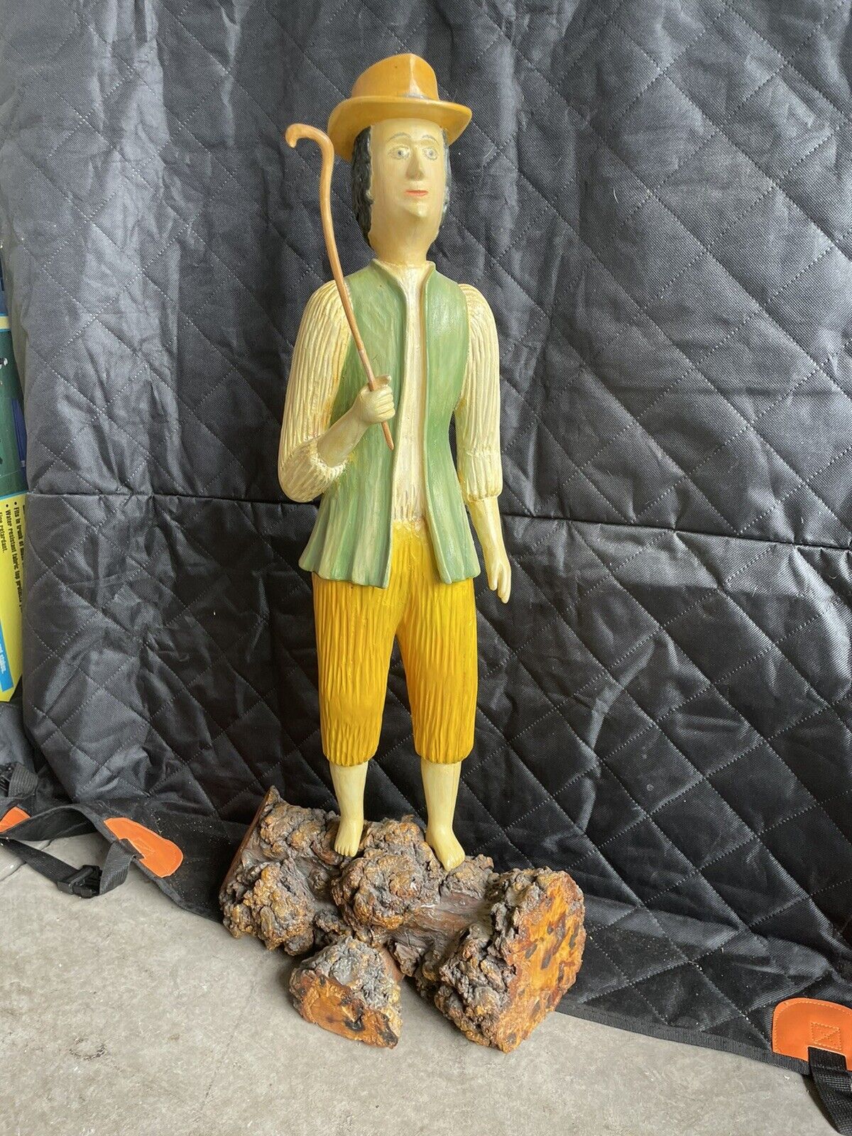 very unique extra large figurine- farmer on a log- 2 pieces