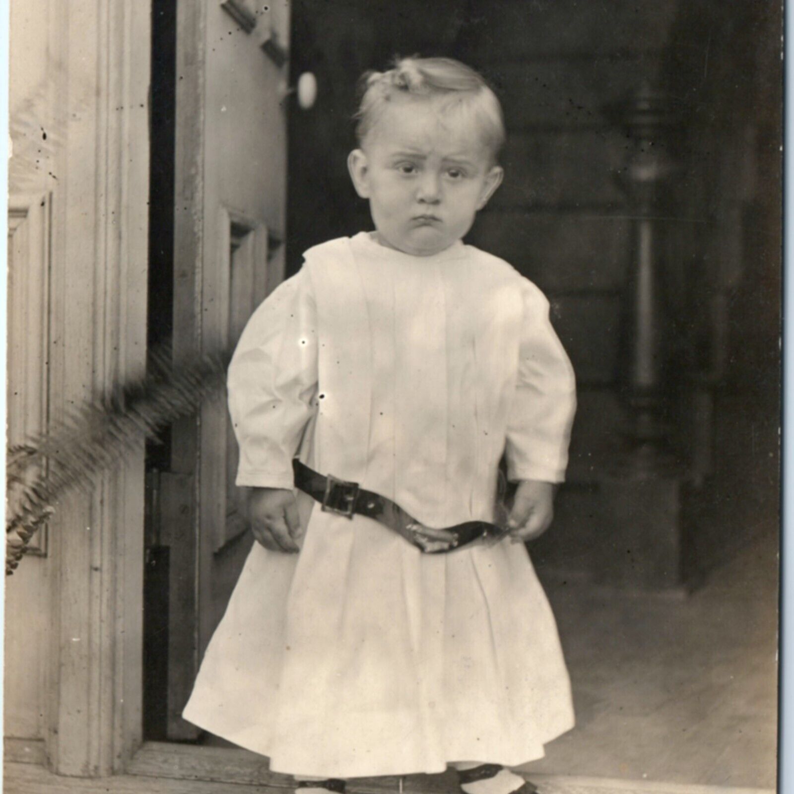 c1910s Standing Baby Boy? in Dress RPPC Cute Serious Child Real Photo PC A139