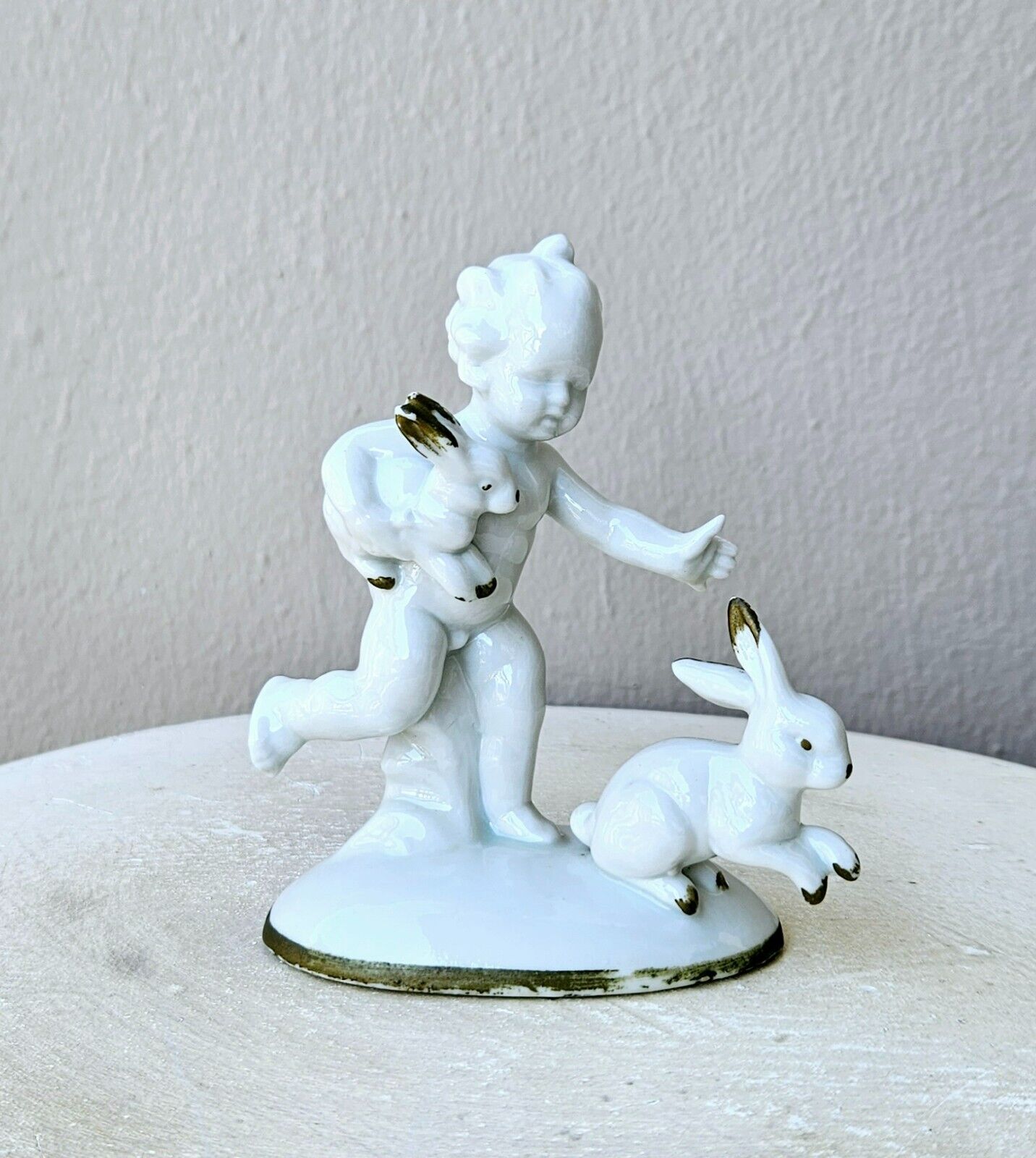 Grafenthal Antique porcelain figurine of Putti with hares Germany Early 20th