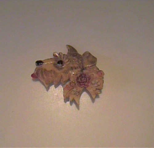VINTAGE 1950\'S CELLULOID PLASTIC SCOTTIE DOG WITH FLOWERS PIN