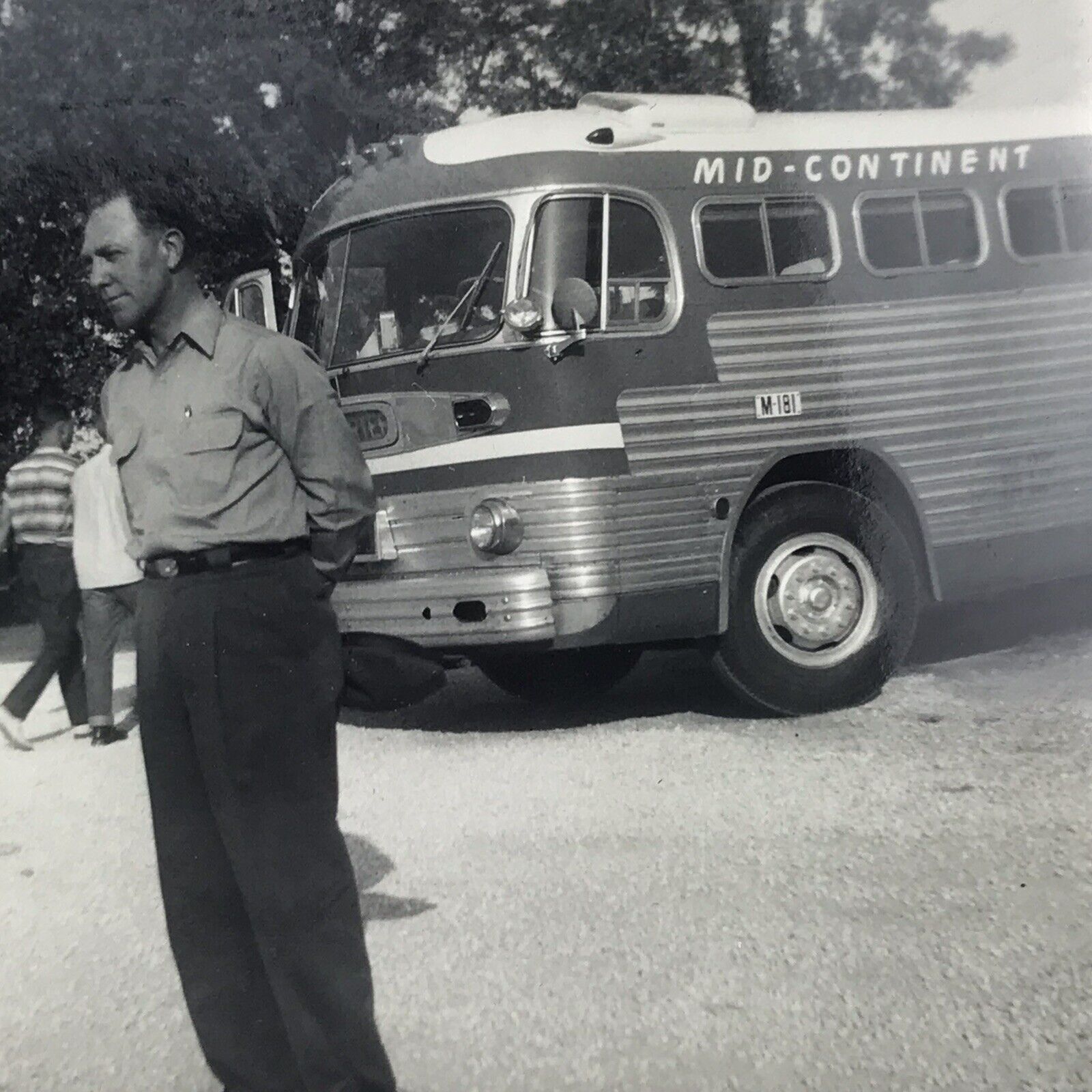 Vintage 1956 Black and White Photo Man Standing Mid Continent Travel Bus Parked 