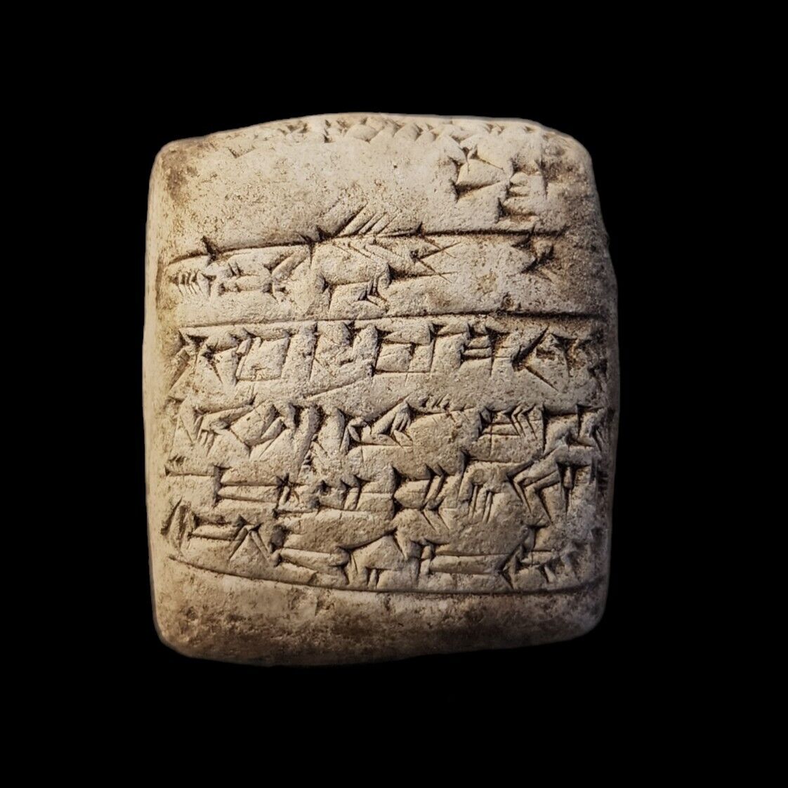 CIRCA NEAR EASTERN CUNEIFORM CLAY TABLET WITH EARLY FORM OF WRITINGS.