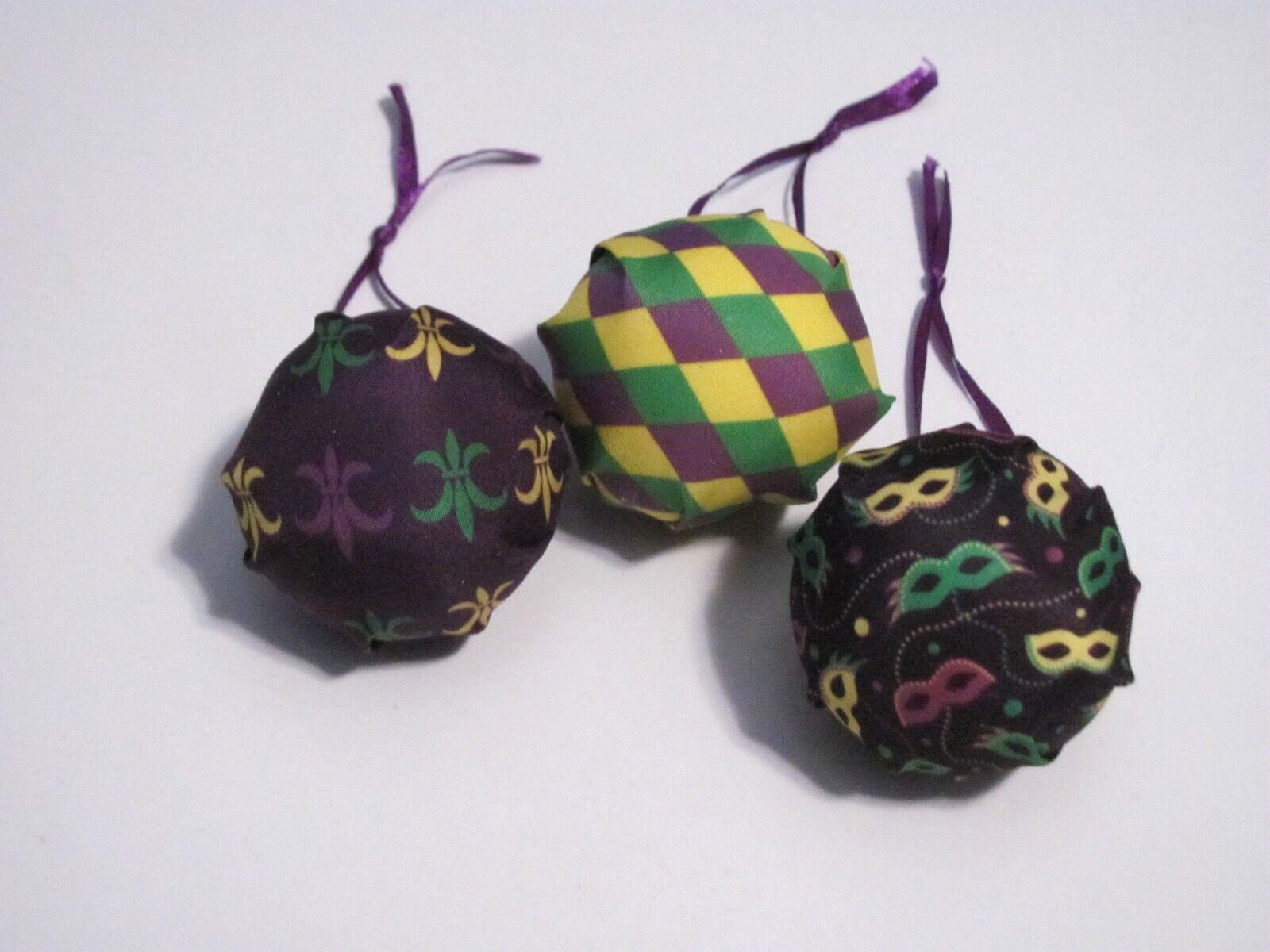 NWOT LOT OF 3 MATERIAL COVERED MARDI GRAS THEMED ROUND ORNAMENTS