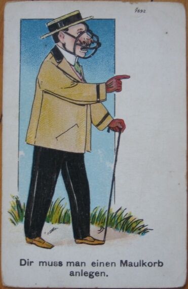1908 Postcard - Man Wearing Dog Muzzle & Walking w/Cane