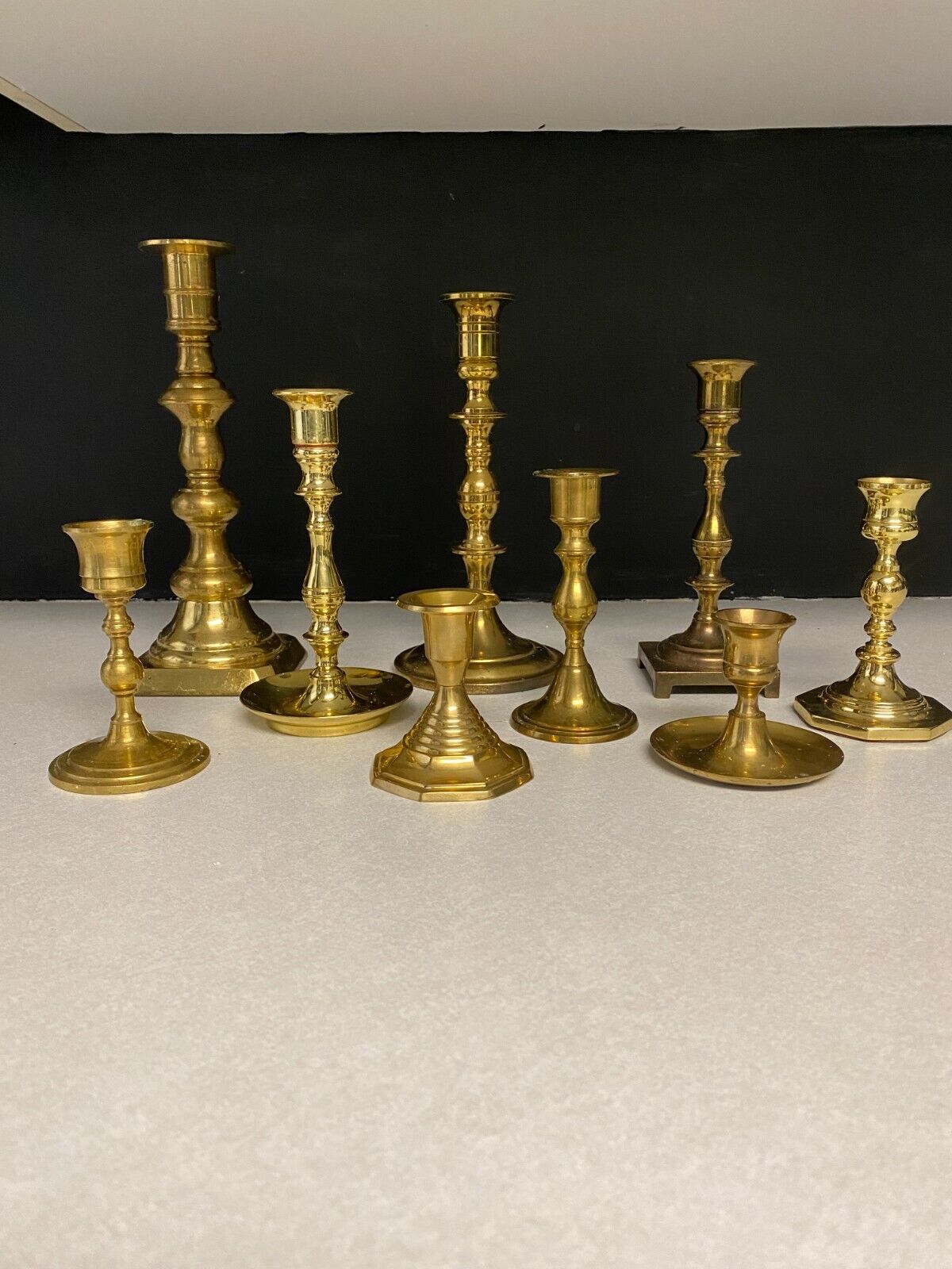 Brass Candlesticks Mixed grouping of 9