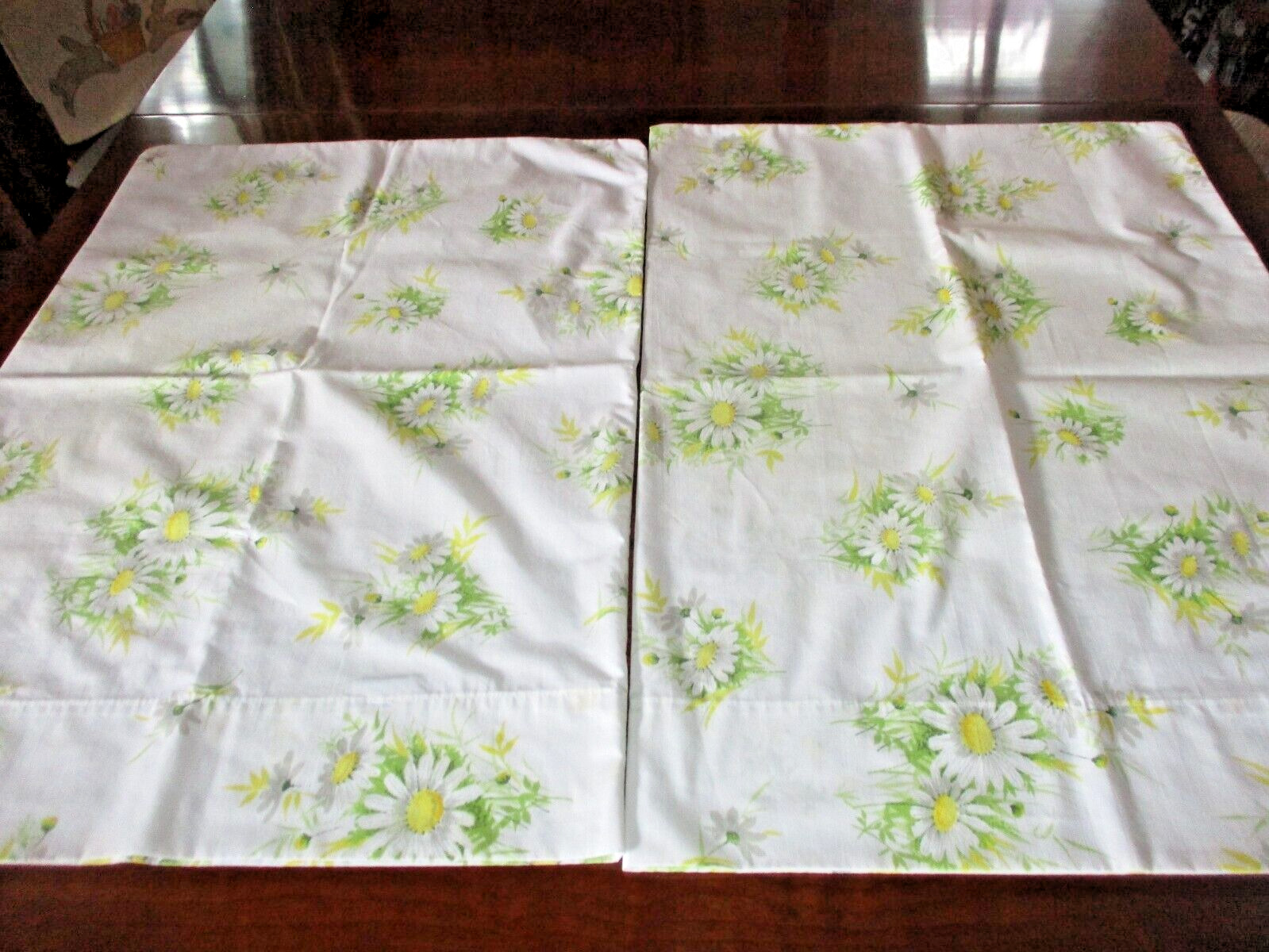 Pair of vintage cotton standard pillow cases with daisy print