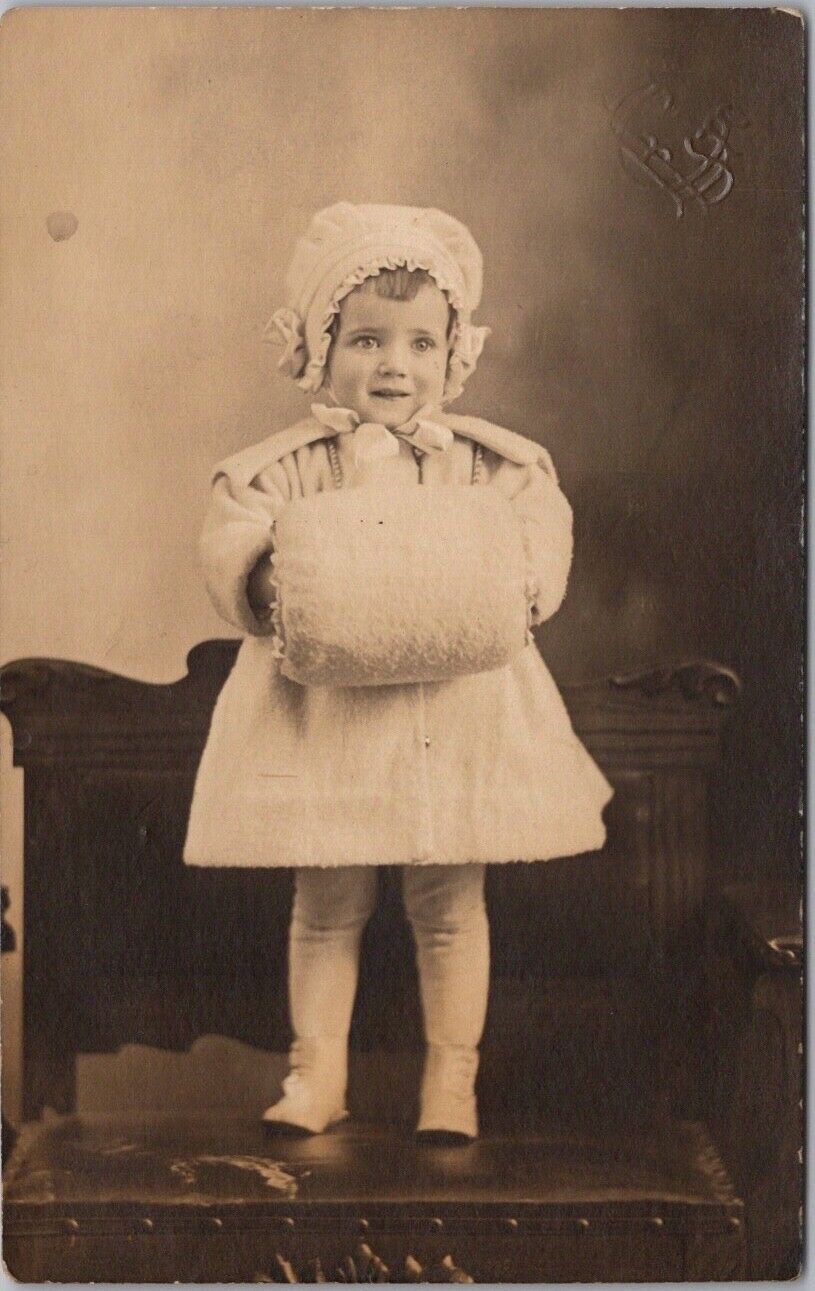c1910s RPPC Photo Postcard Very Cute Little Girl / Fur Muff - Looks like a Doll