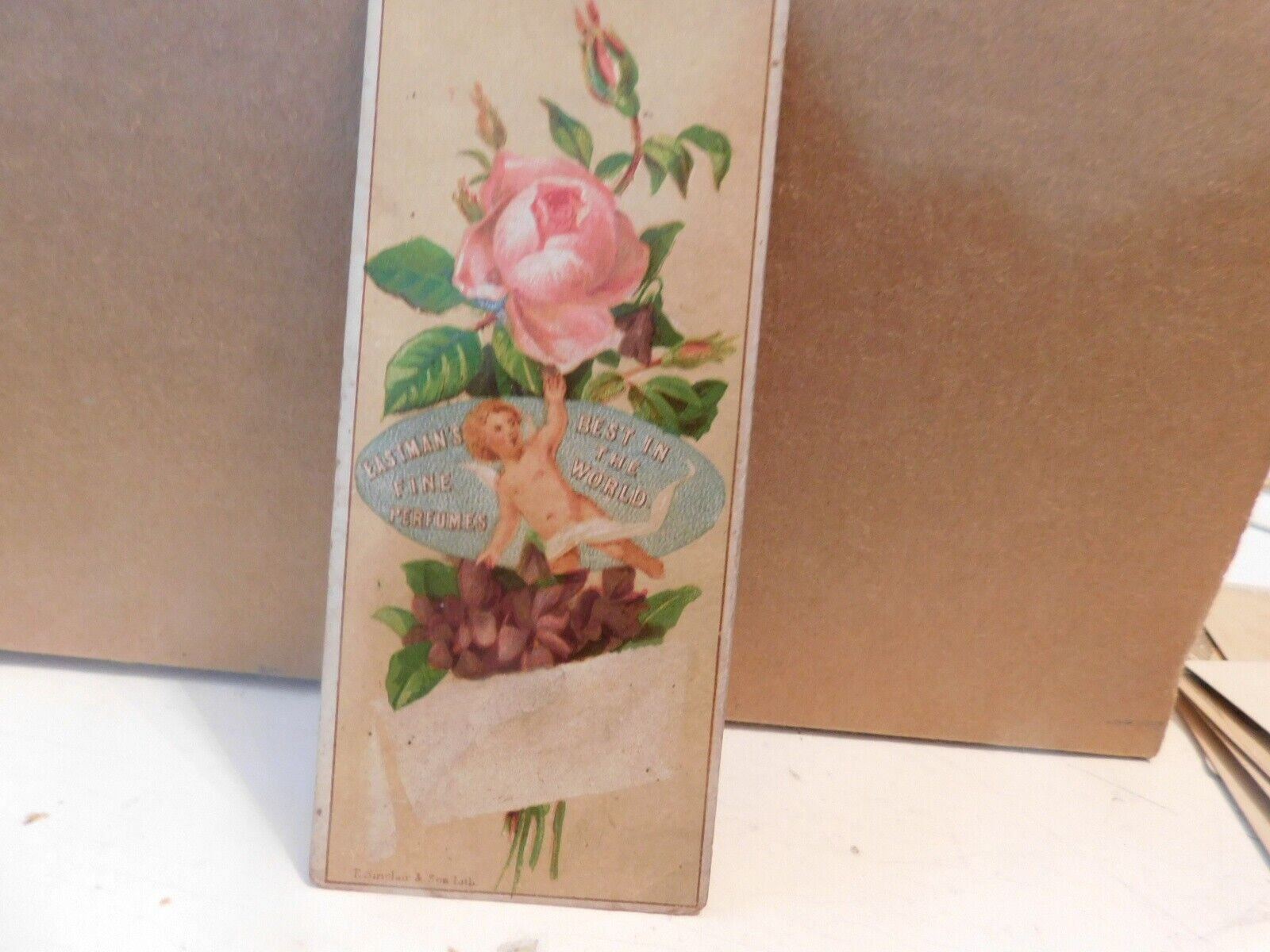 1800\'s Trade Card Flowers W/ Cherub  Eastman\'s Fine Perfumes
