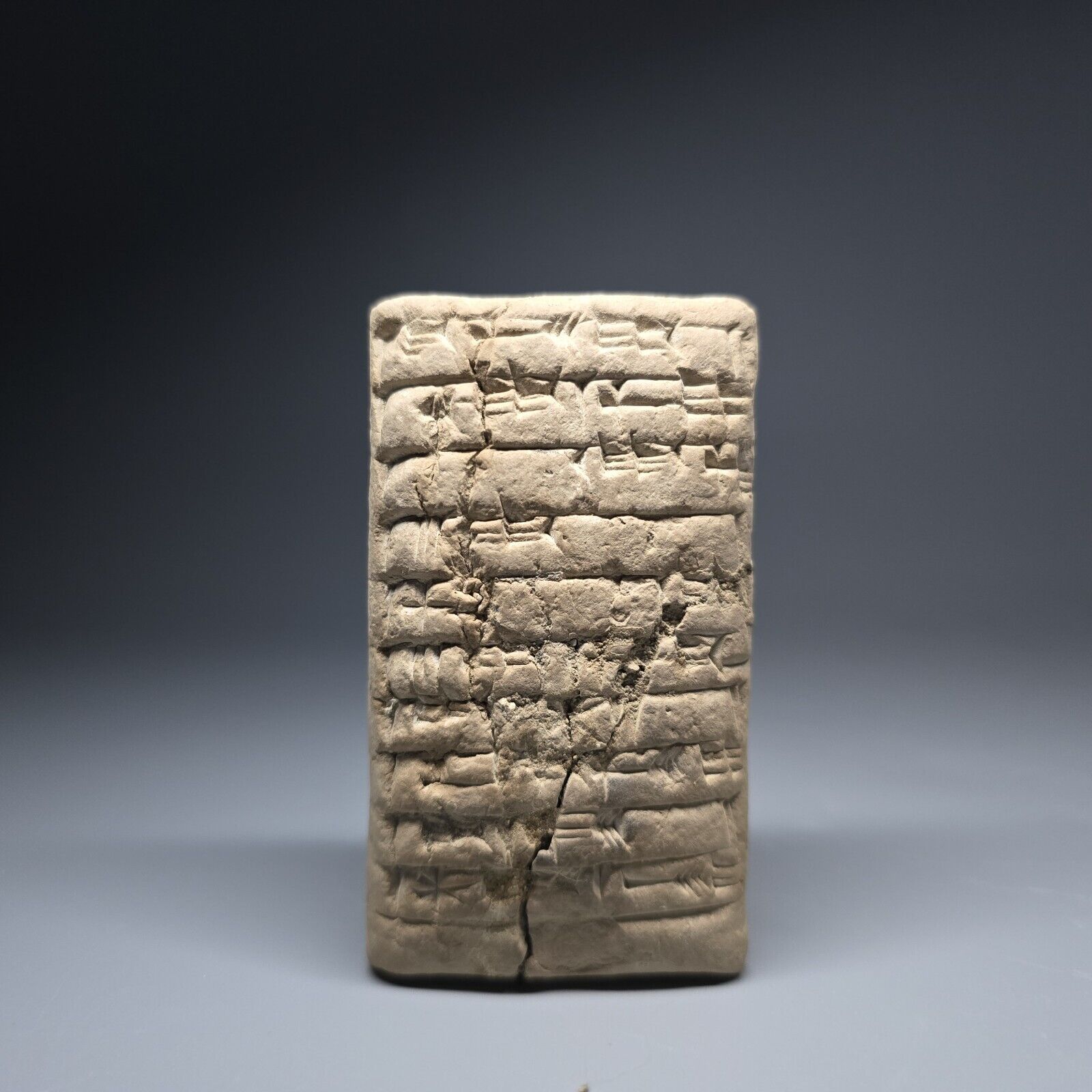 CIRCA AN  BABYLONIAN CUNEIFORM CLAY TERRACOTTA TABLET WITH EARLY FORM OF WRITING